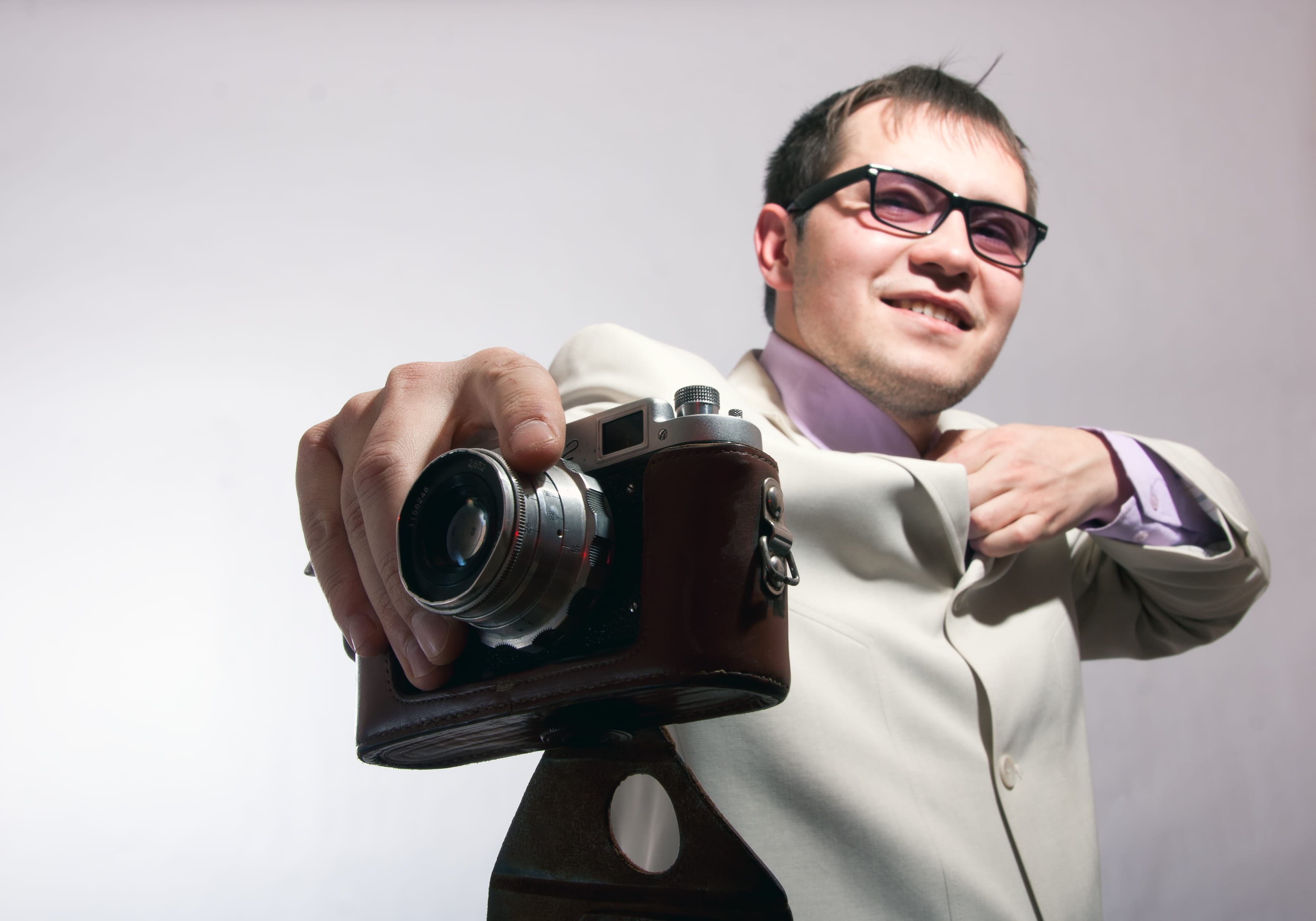 adult, holding, suit, one person, photo, lens, studio shot, objective, males, camera - photographic equipment, professional, technology, glass, guy, smiling, HD Wallpaper