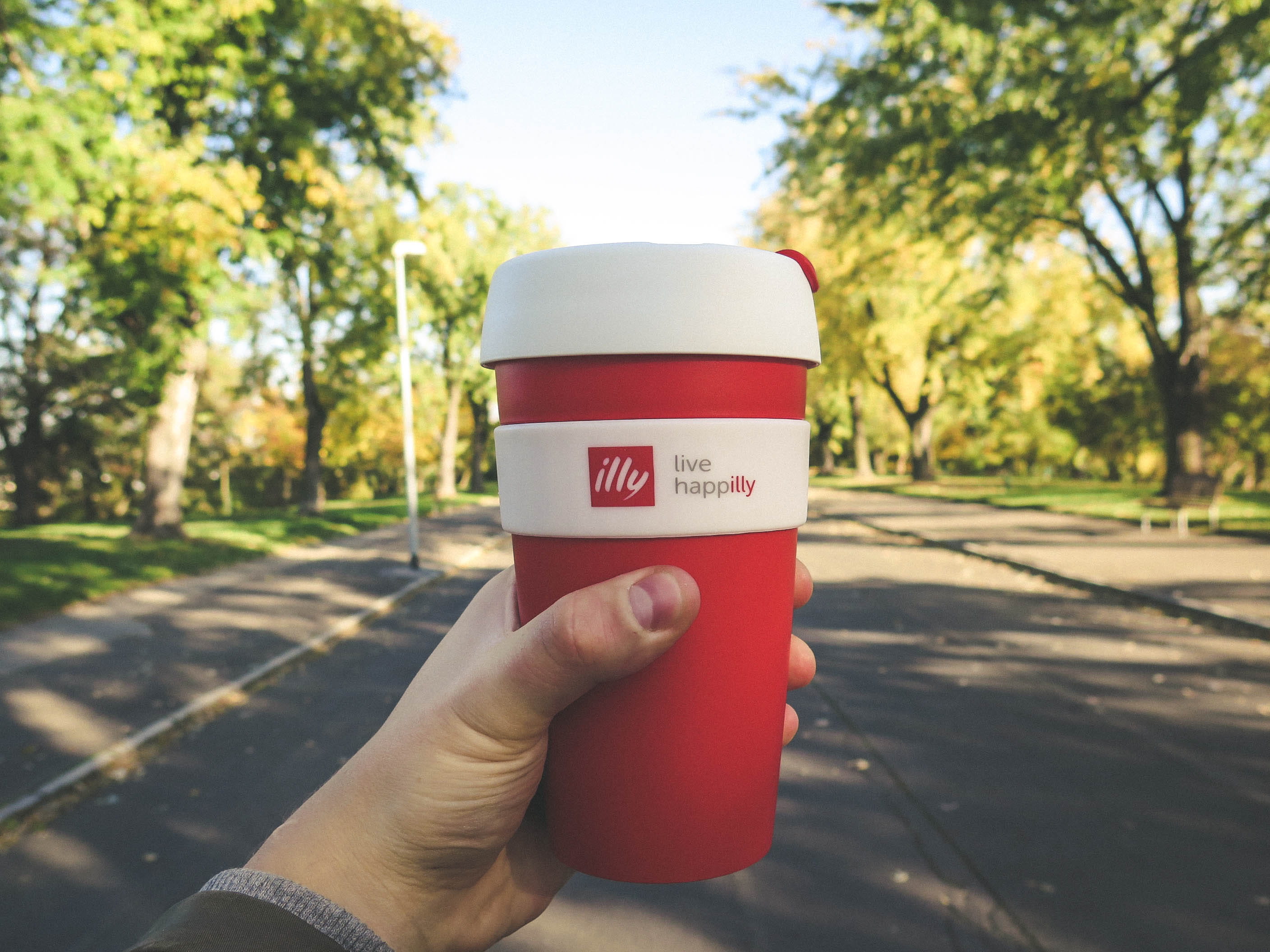 personal perspective, human hand, plastic, close-up, coffee cup, road, refreshment, finger, body part, cup, container, environment, hand, focus on foreground, HD Wallpaper