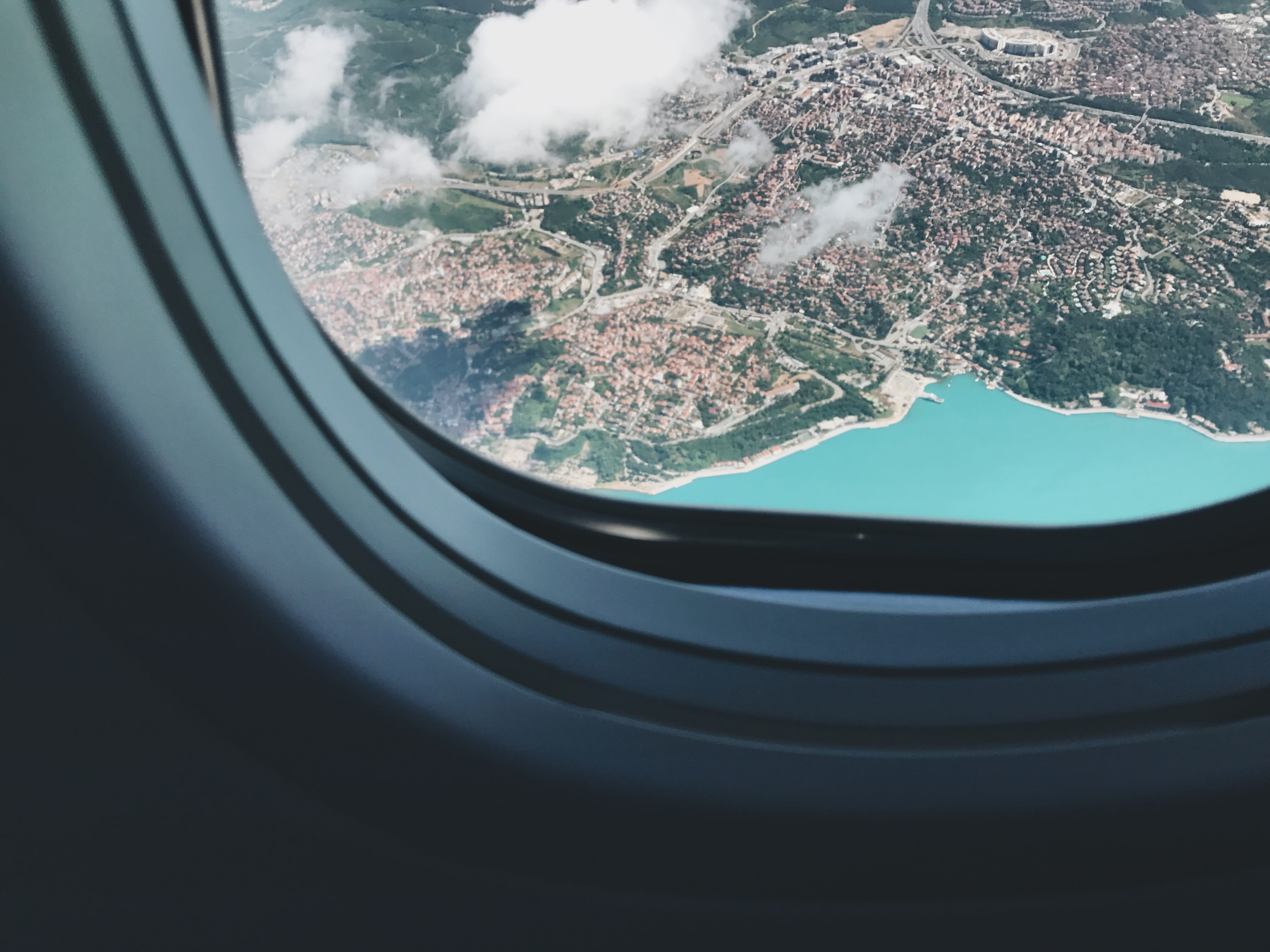 island, city, water, glass - material, 4K, s, transportation, no People, flying, commercial Airplane, transparent, airplane window, day, view, sea, mode of transportation, HD Wallpaper