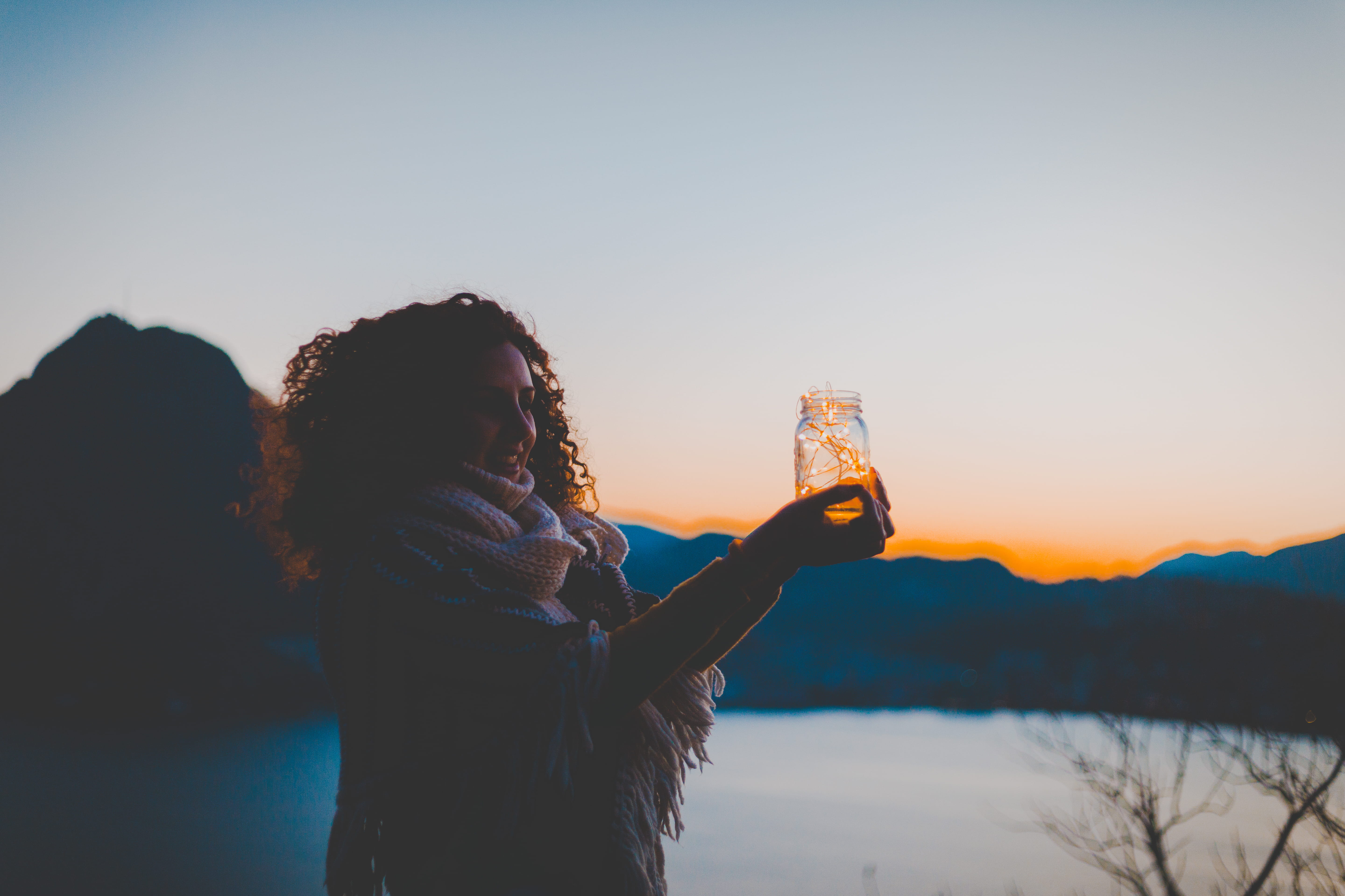 mobile phone, string lights, adult, photography themes, lights, wear, golden, view, water, glass jar, light, leisure activity, smart phone, mountain, side view, HD Wallpaper