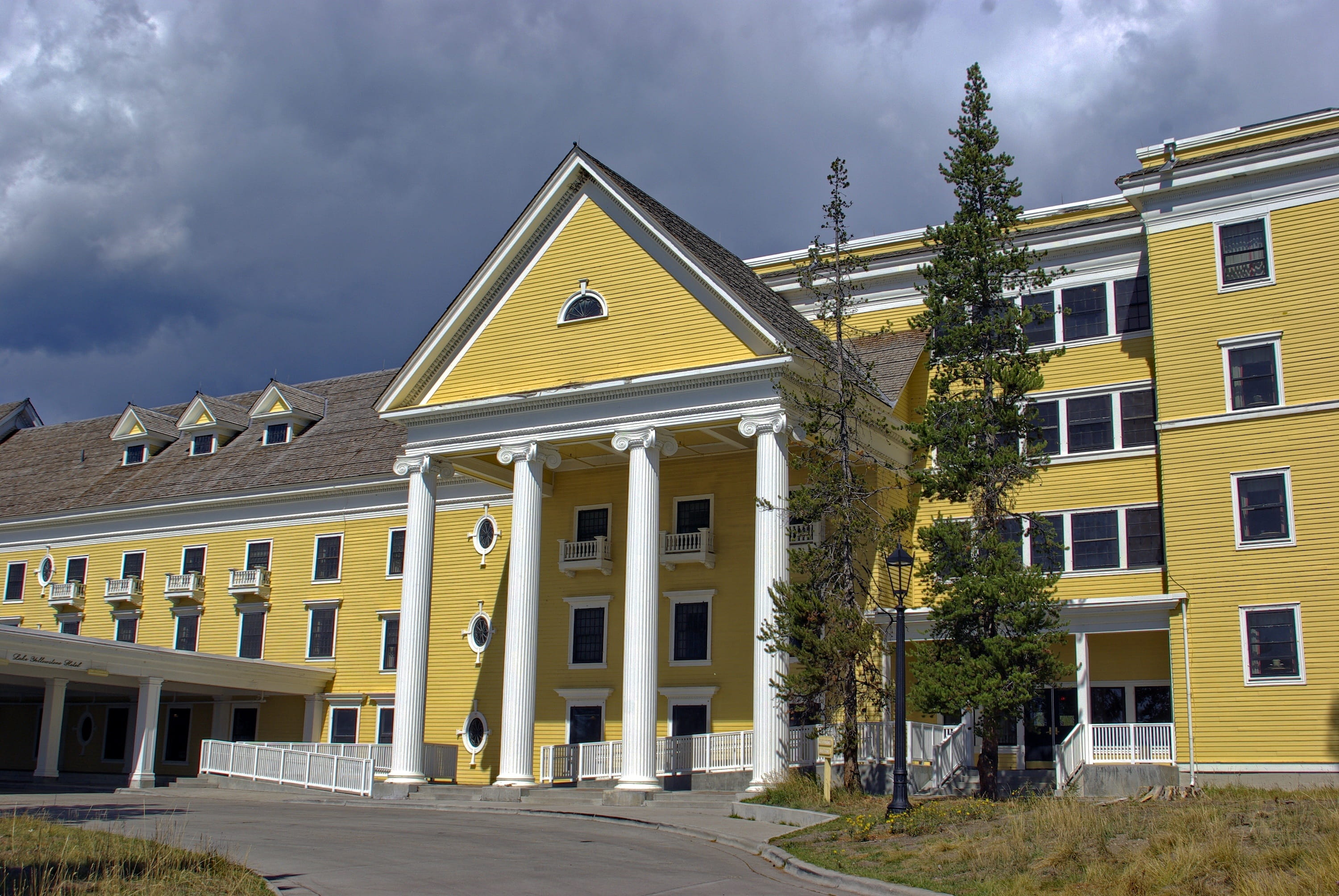 outdoors, low angle view, architecture, yellow, clouds, nature, facade, yellowstone, plant, building exterior, city, day, window, national, building, usa, HD Wallpaper