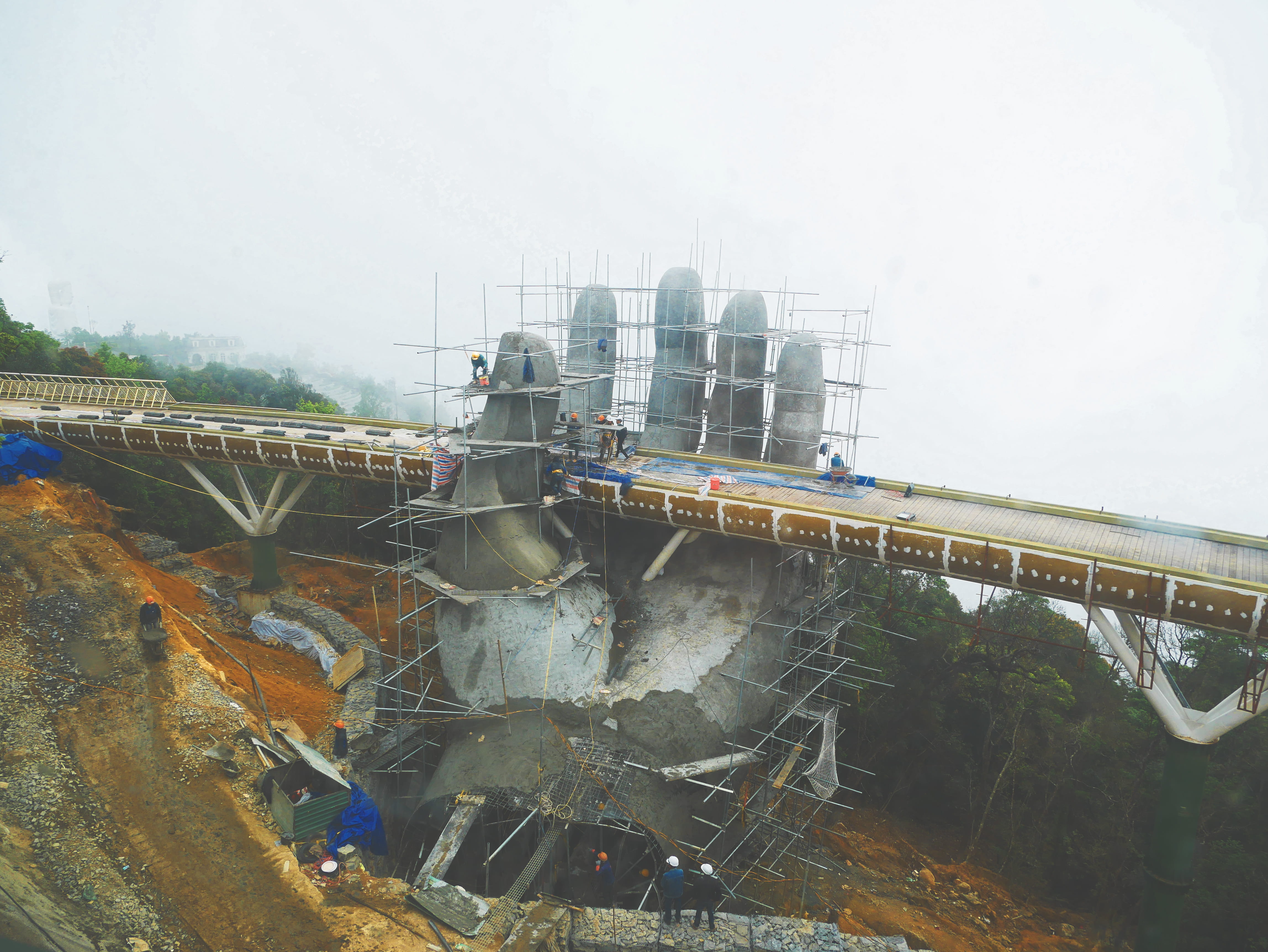hands, hardhat, clear sky, ba na hills sunworld, 4K, pollution, building exterior, clouds, nature, fog, ginat hand, outdoors, hand, architecture, mode of transportation, HD Wallpaper