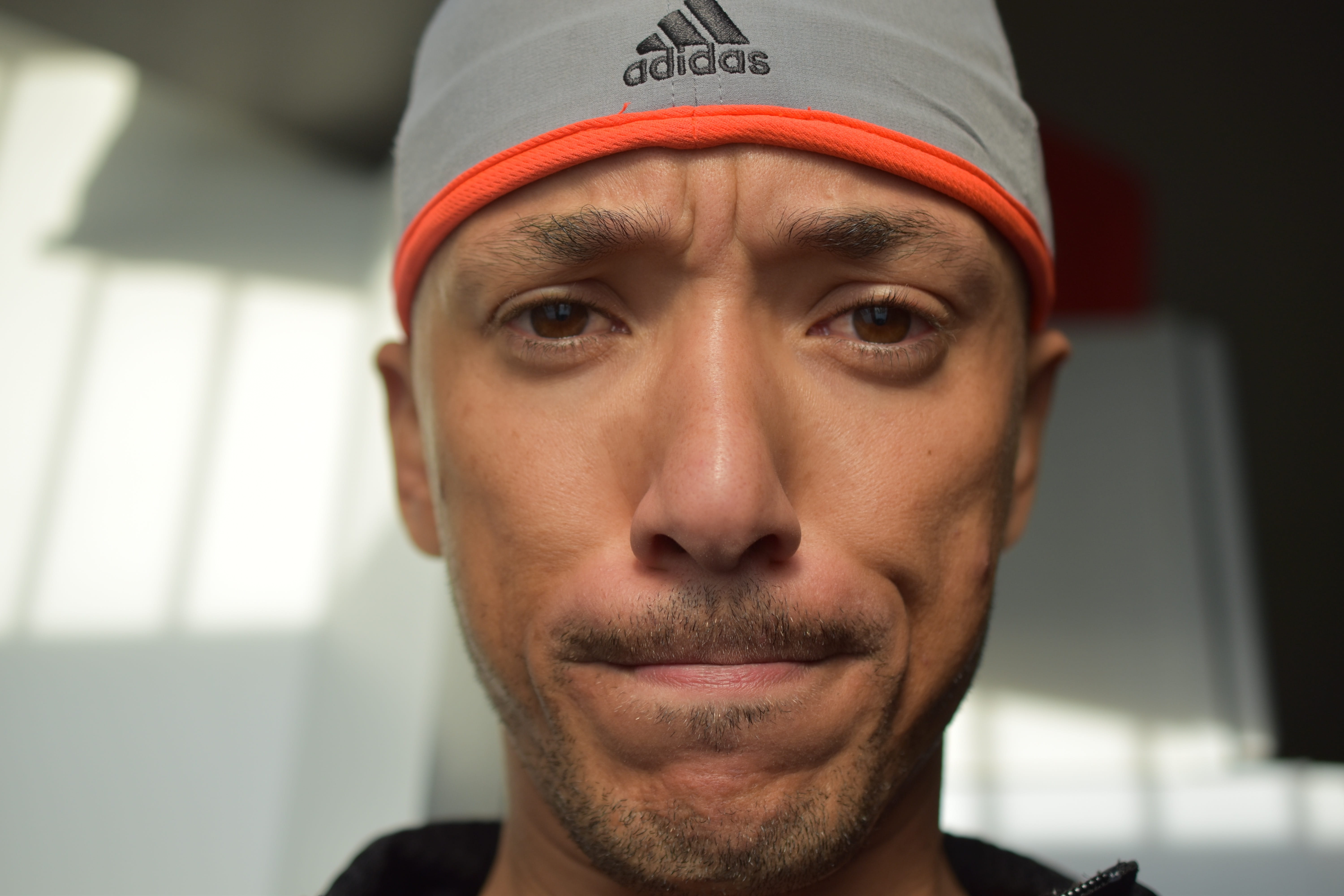 headshot, 5K, human face, men, indoors, hat, lips pursing, gray, one person, beard, Male, front view, wearing, Gesture, Look, one man only, adult, young, HD Wallpaper