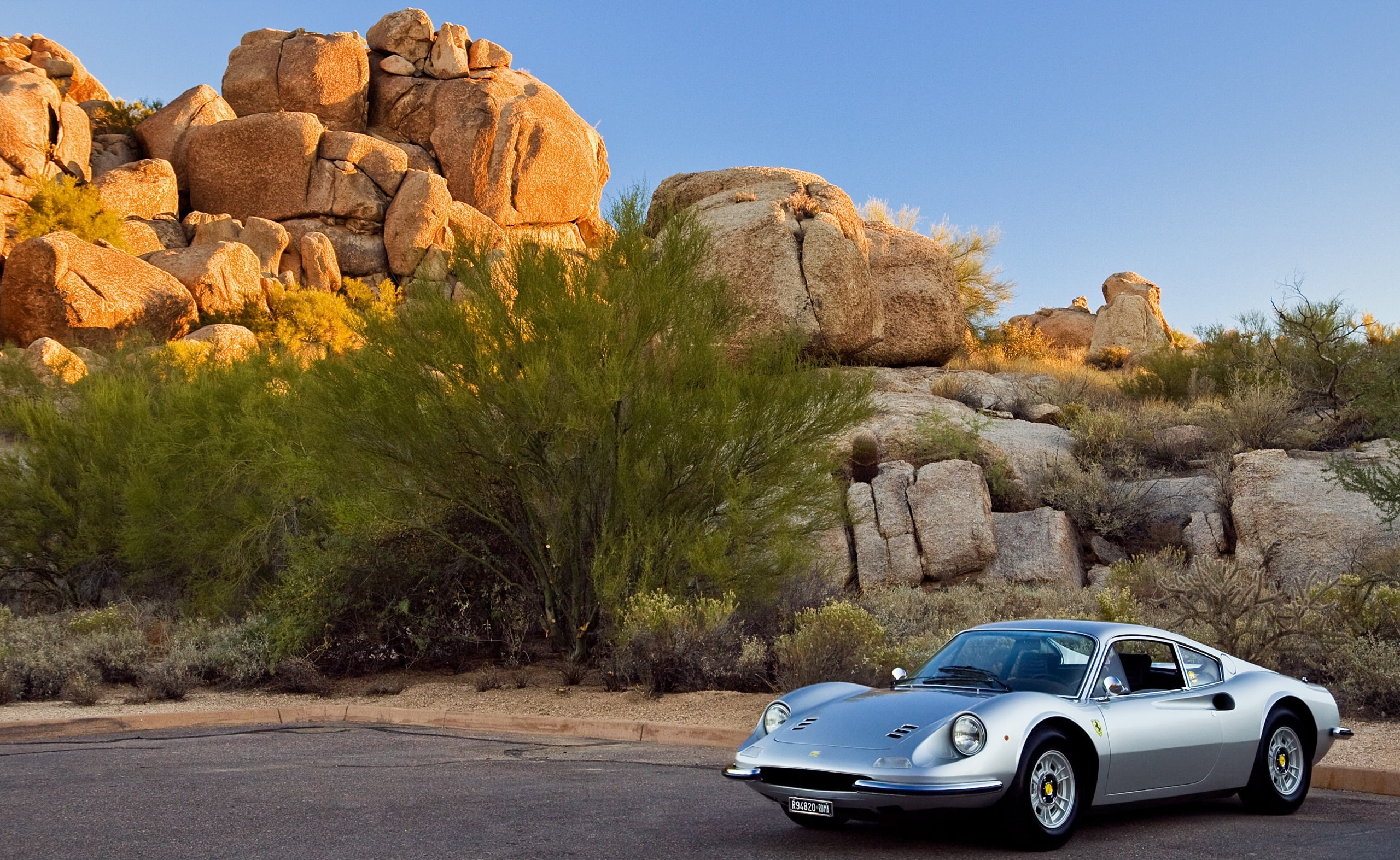 car, plant, classic car, rock, Classic Cars, beauty in nature, silver, sky, travel, semi-arid, gt, tree, land vehicle, solid, no people, datsun, HD Wallpaper