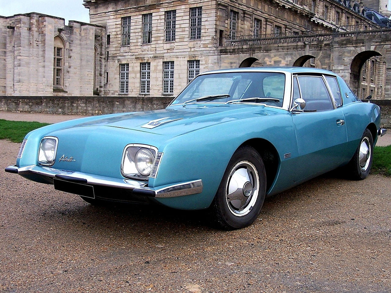 retro styled, 720P, motor vehicle, blue, old, architecture, coupe, parking, road, Cars, Avanti, building exterior, mode of transportation, studebaker, HD Wallpaper