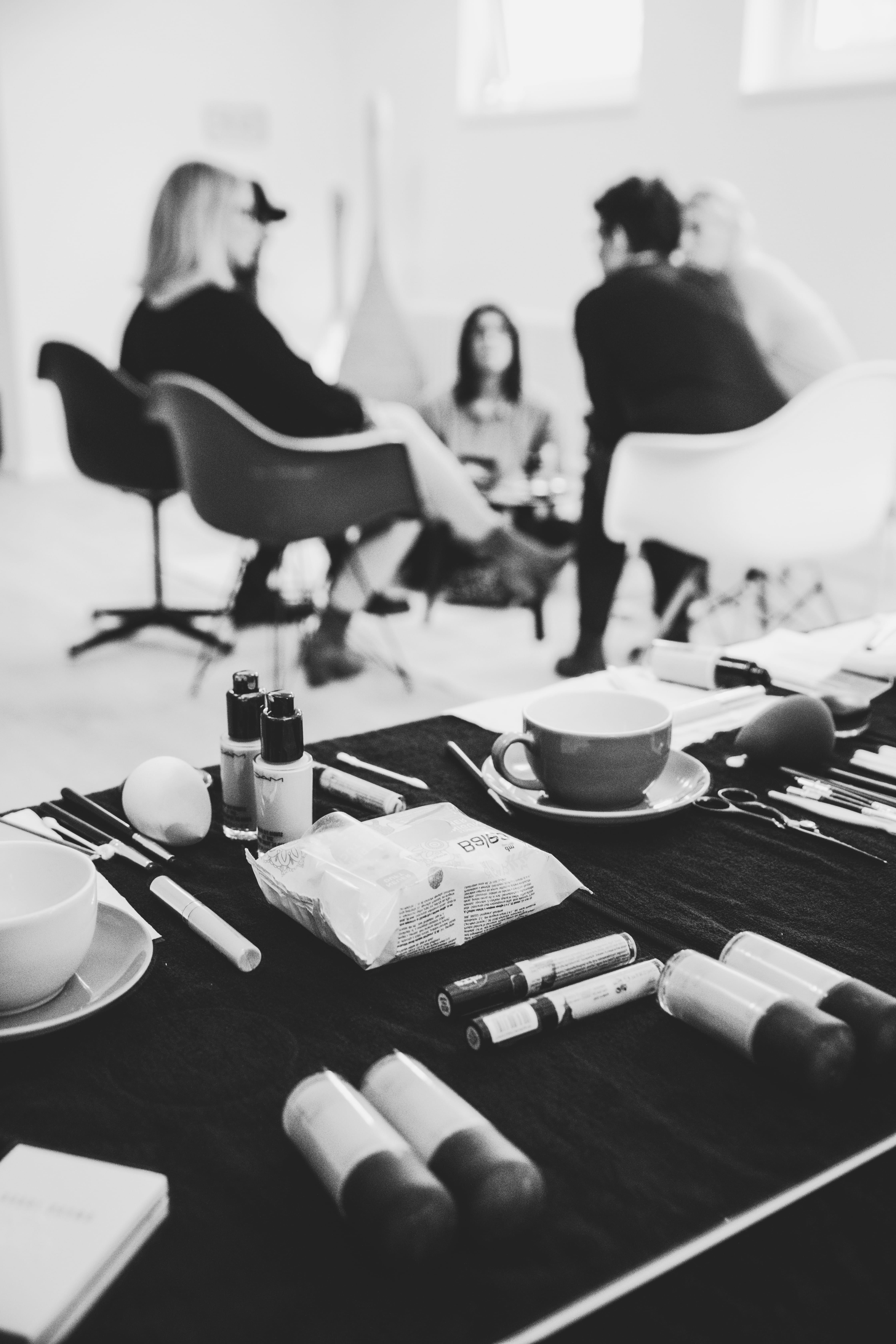 sitting, make up brush, indoors, photography, focus on foreground, group together, grayscale, women, table, make up, room, chair, people, home interior, Phone HD Wallpaper