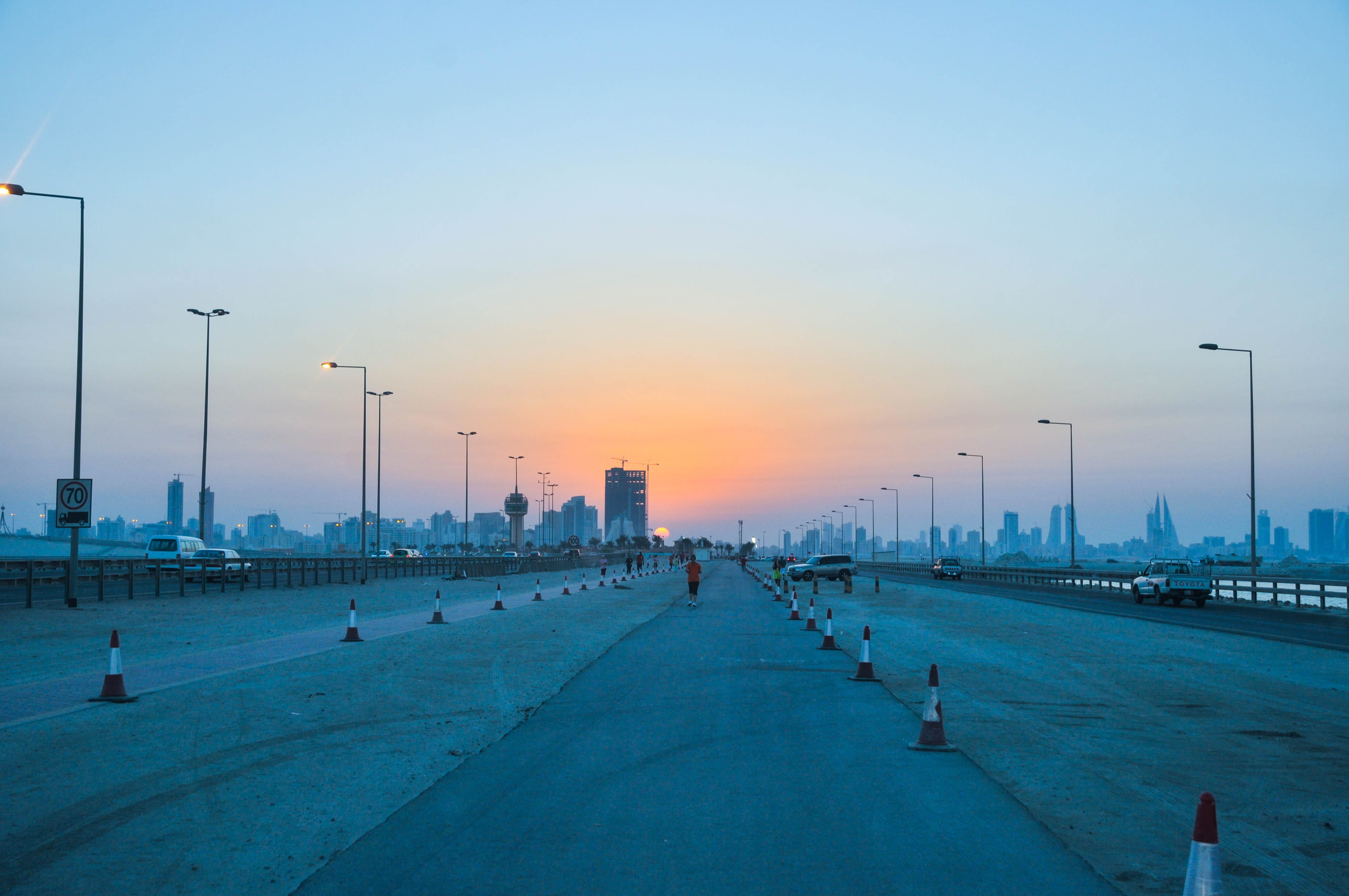 lighting equipment, diminishing perspective, skyscraper, Bahrain, architecture, the way forward, water, Sunset, harbor, city, sundown, street light, road, HD Wallpaper