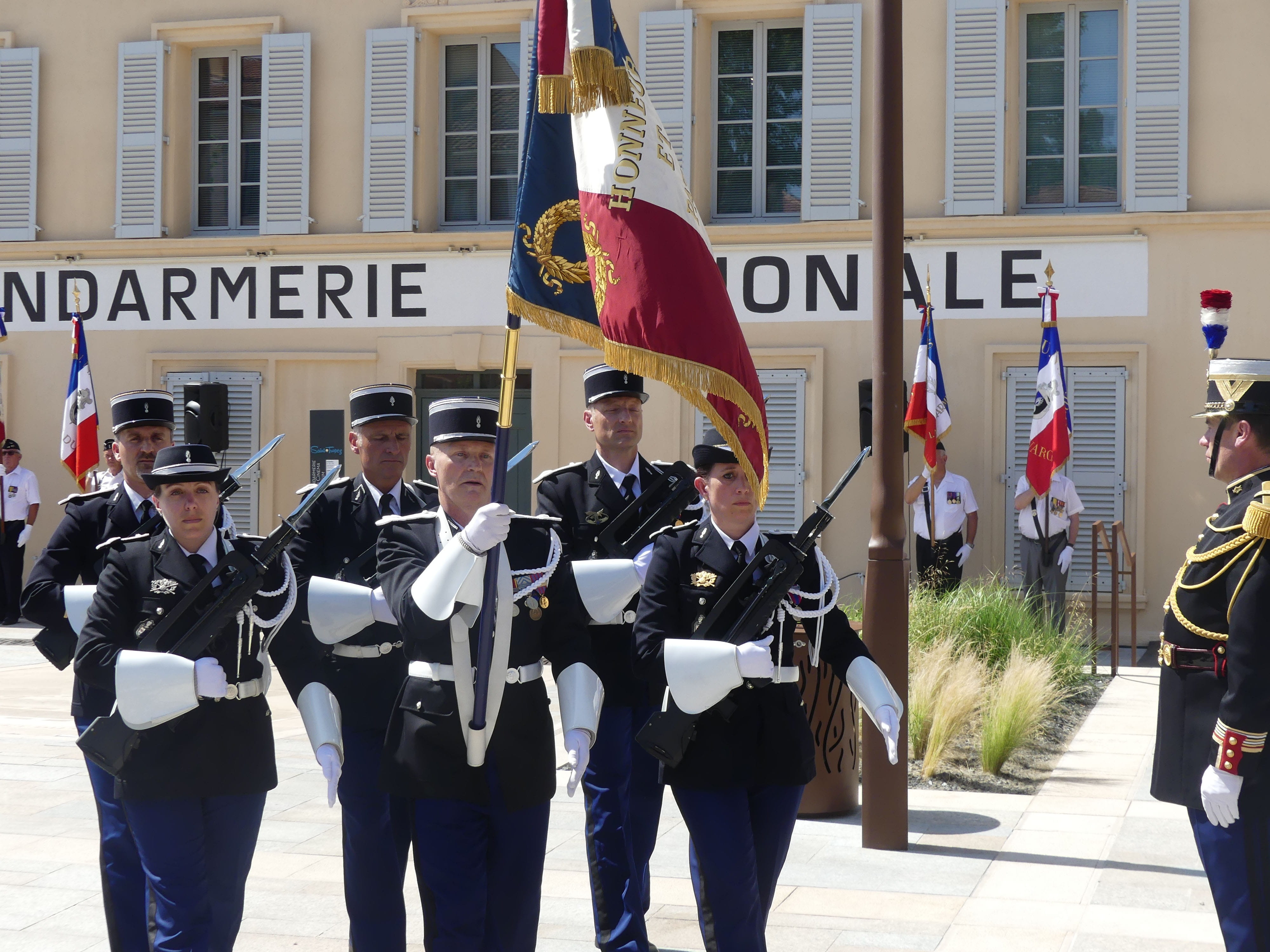 riot, building exterior, architecture, western script, St Tropez, parade, marching band, 4K, text, Museum, built structure, city, police Force, crowd, HD Wallpaper