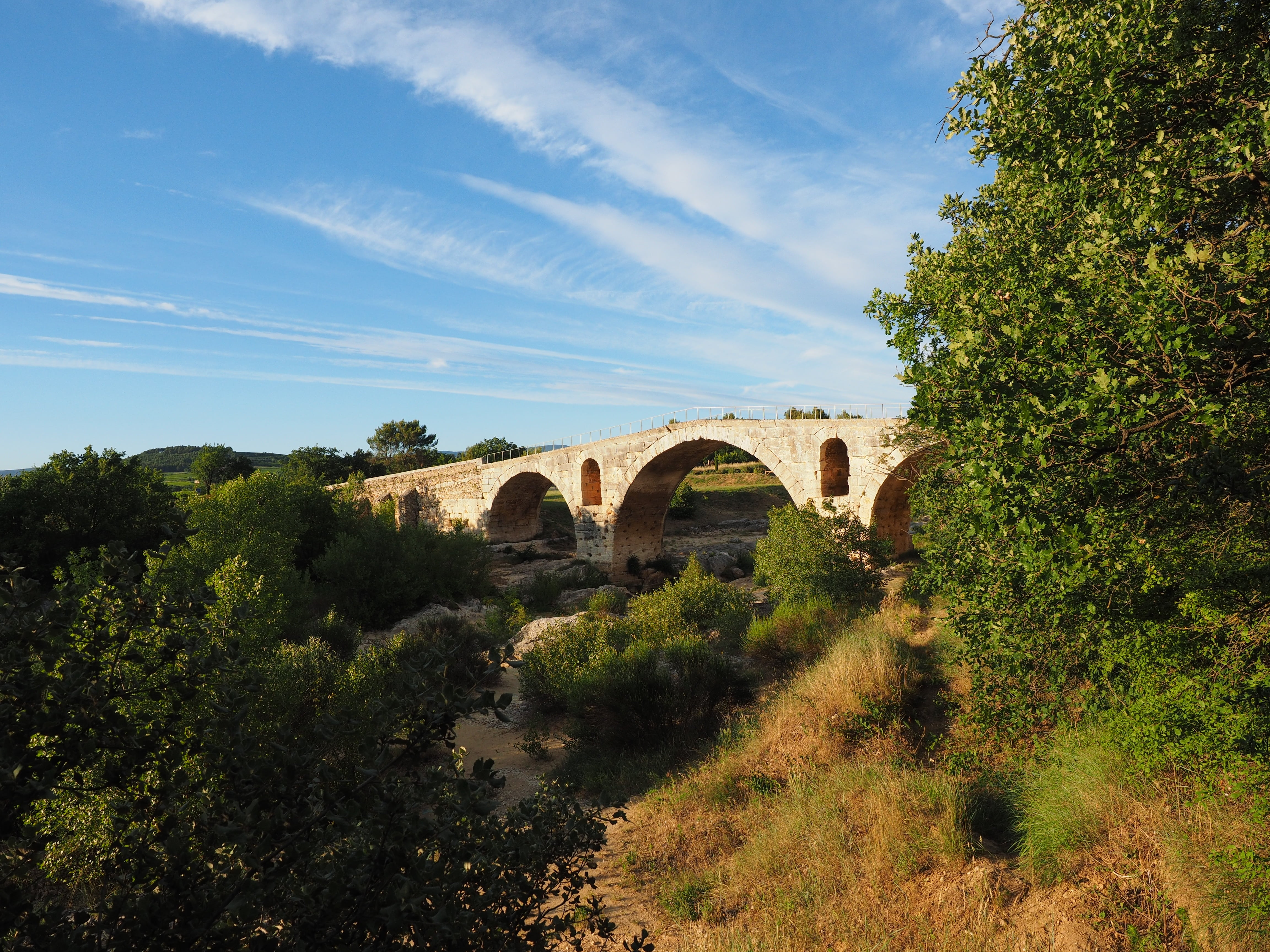 roman, sunlight, built structure, calavon, stone arch bridge, bridge, person, tree, provence, transportation, architecture, sky, pont julien, day, history, HD Wallpaper