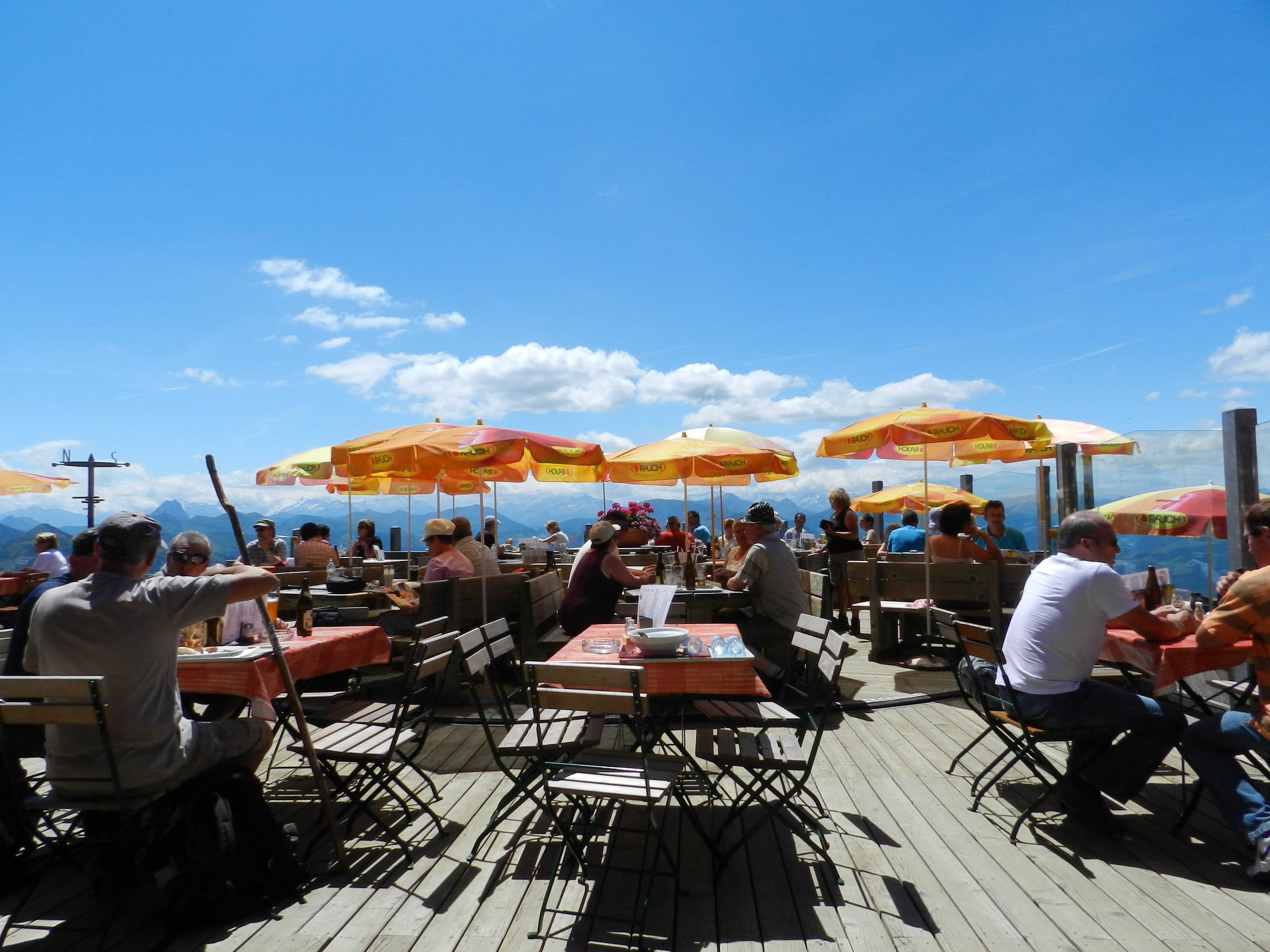 chair, women, austria, food and drink, crowd, table, business, men, umbrellas, real people, sky, people, outdoors, sidewalk cafe, adult, sitting, leisure activity, HD Wallpaper