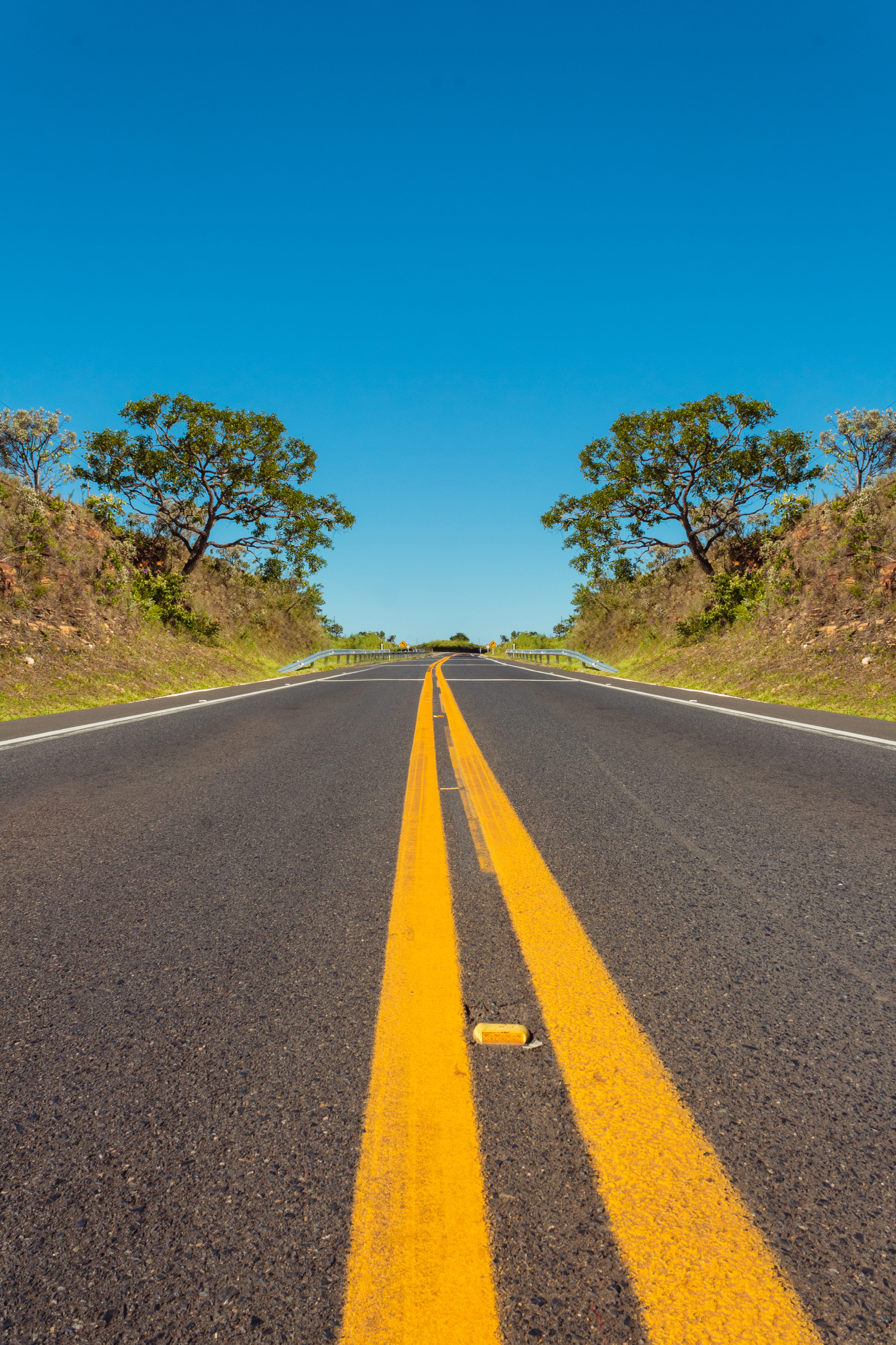 green, roadway, symbol, blue, 5K, dividing line, road marking, the way forward, sky, direction, road, transportation, sign, plant, no people, grass, lane, Phone HD Wallpaper