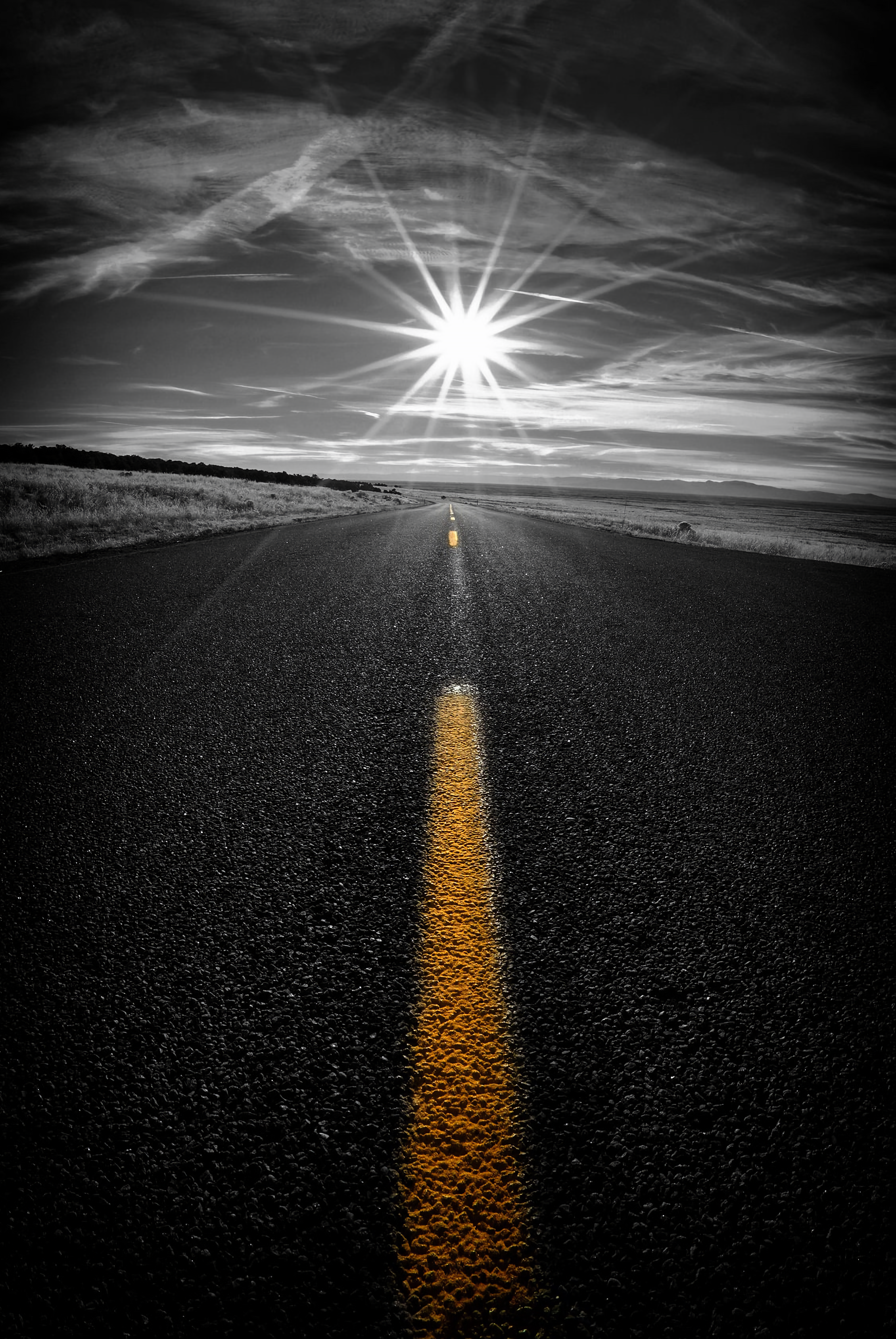 lens flare, direction, sunlight, arrow symbol, dividing line, the way forward, yellow, marking, asphalt, straight, sign, surface level, sky, street, guidance, Phone HD Wallpaper