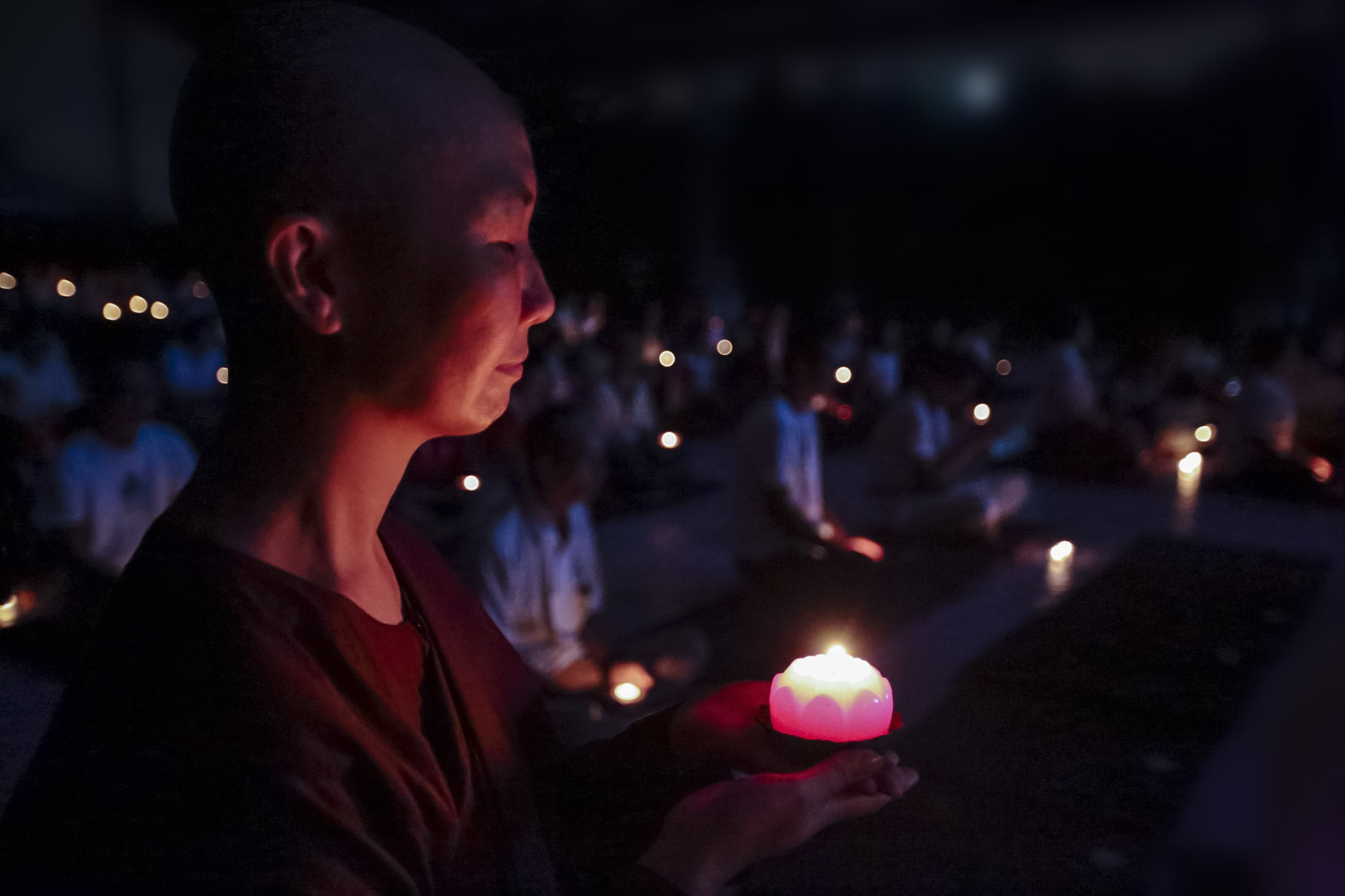 indoors, religious, contemplation, traditional, young men, young adult, illuminated, nun with candle, portrait, religion, 2K, burning, buddhist, profile view, HD Wallpaper