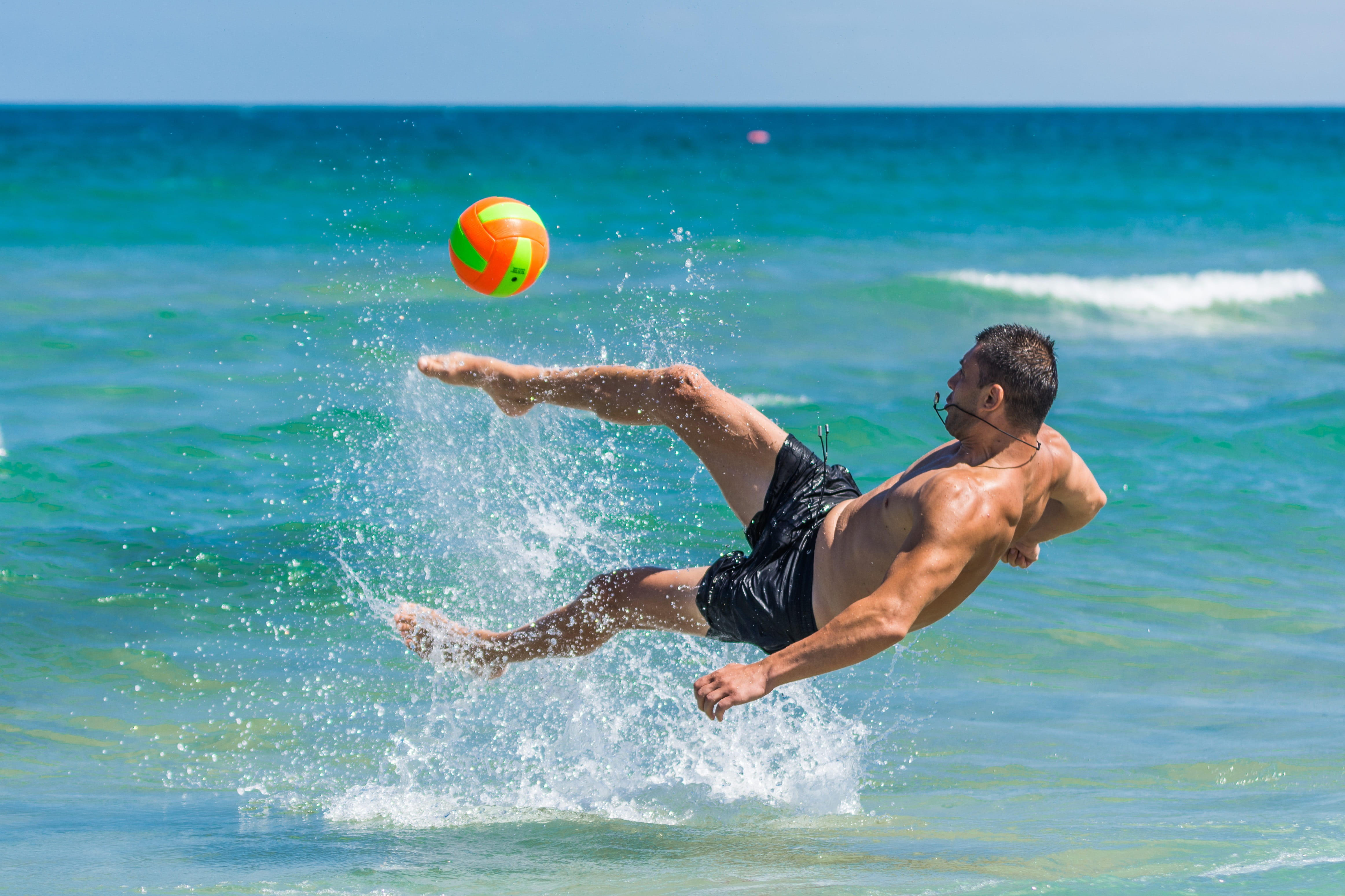horizon, mid-air, one person, men, ball, sky, sea, lifestyles, ocean, young, outdoors, body, motion, playing, leisure activity, sand, lifestyle, wave, man, HD Wallpaper