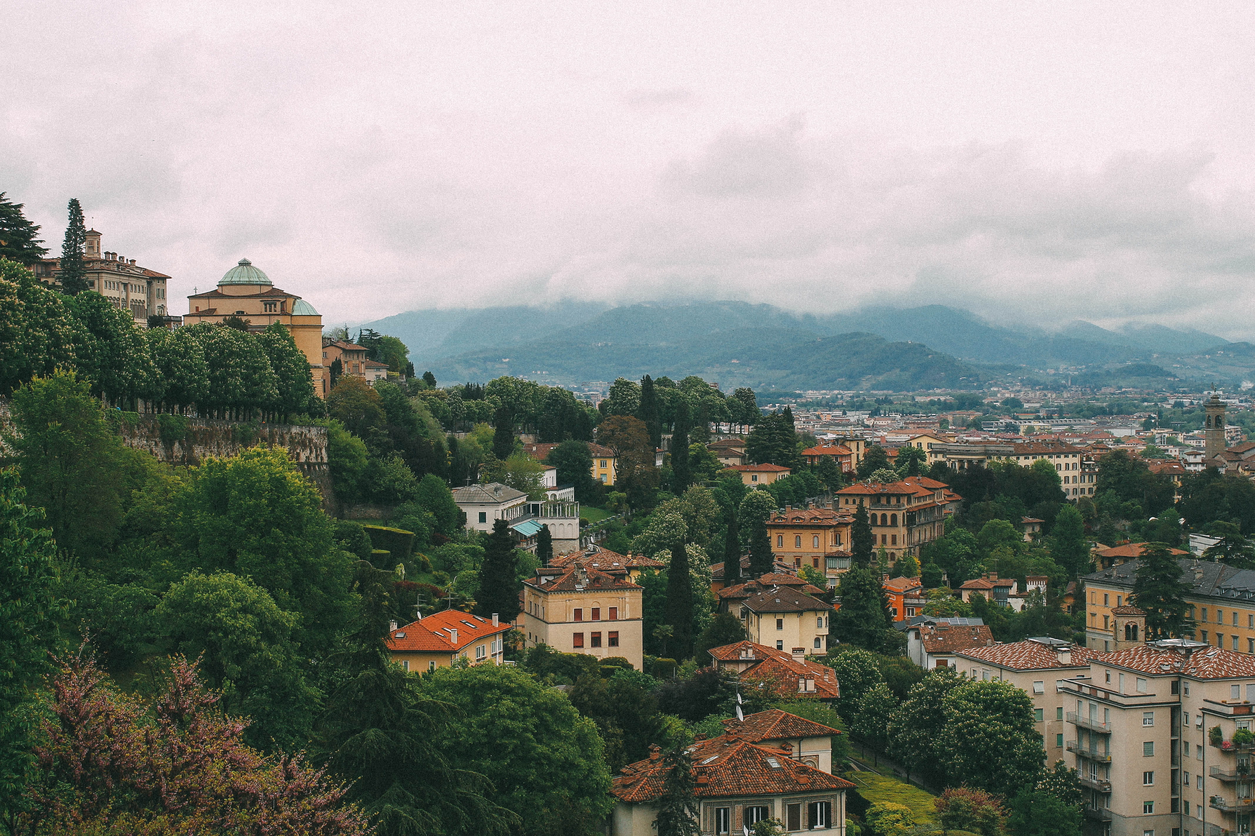 outdoors, italy, building, 4K, province of bergamo, bergamo, nature, mountains, townscape, day, mountain, house, city, building exterior, clouds, cityscape, HD Wallpaper