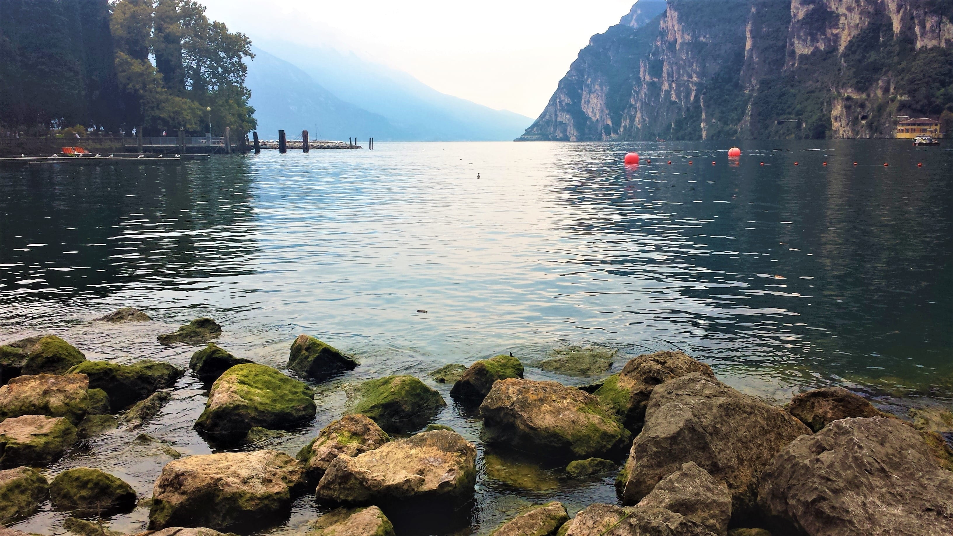 outdoors, nature, landscape, on the lake, solid, 2K, scenics, italy, Garda, tranquil Scene, plant, mountain Range, mountains, summer, tree, sky, costa, HD Wallpaper