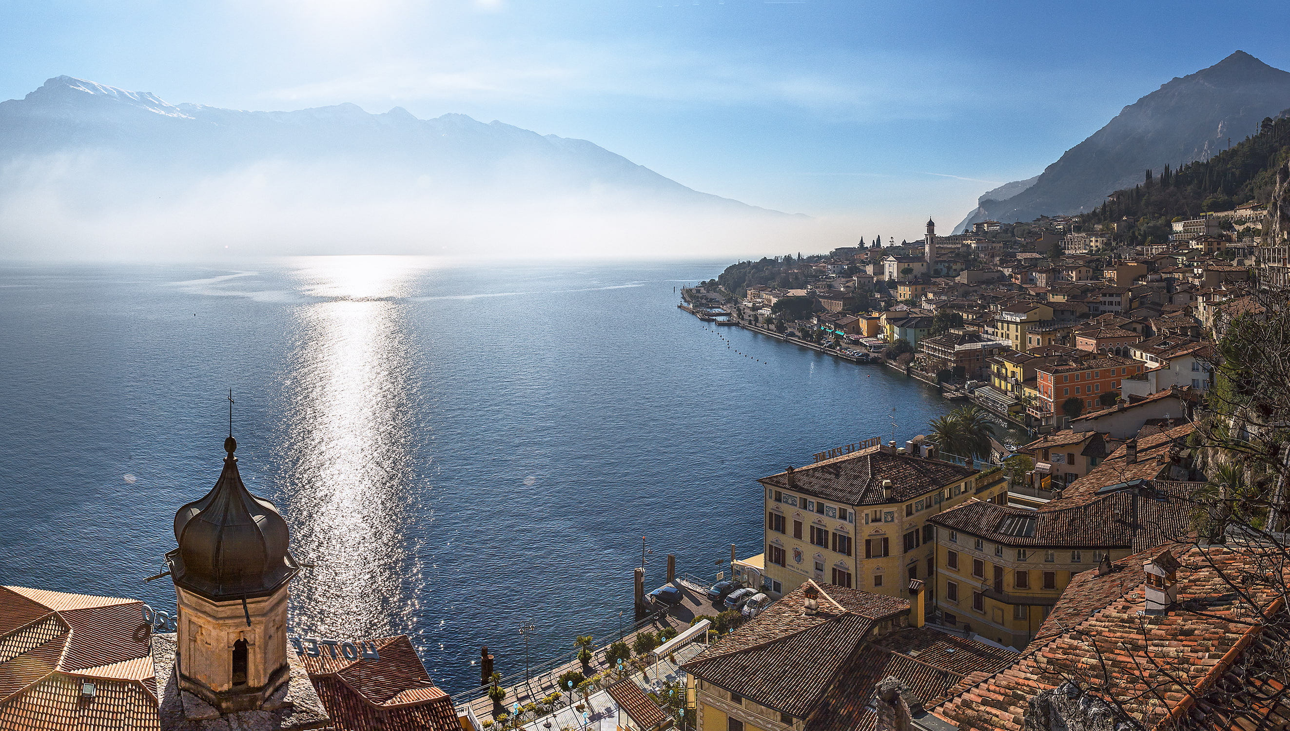 Lombardy, beauty in nature, lake, mountain, mountains, Italy, cloud - sky, 2K, city, travel, Garda, Lake Garda, sea, building exterior, high angle view, HD Wallpaper