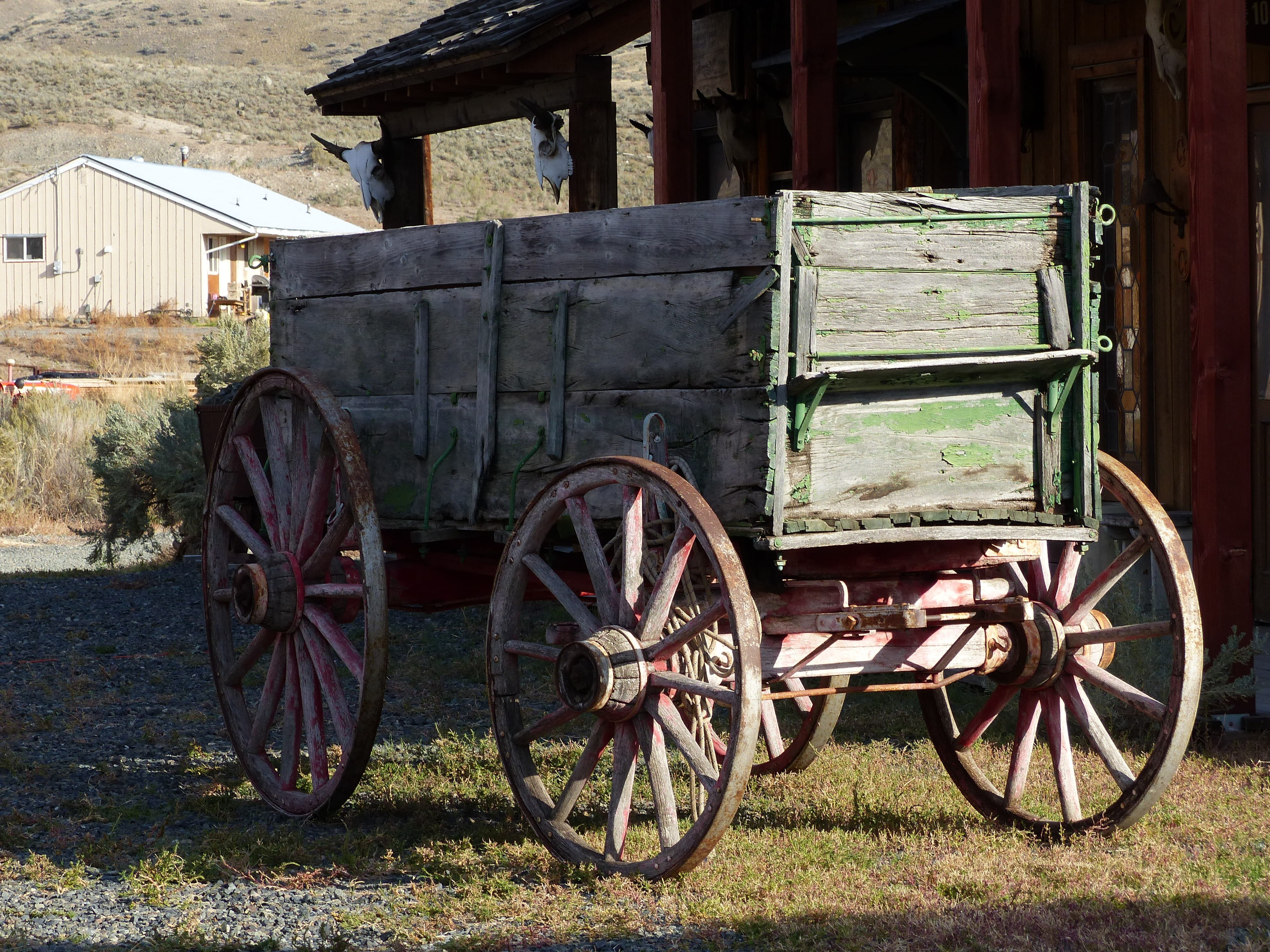 wheel, tourist attraction, british columbia, cart, day, brown, old building, beside, built structure, ghost town, heritage, old-fashioned, green, 4K, mode of transportation, HD Wallpaper