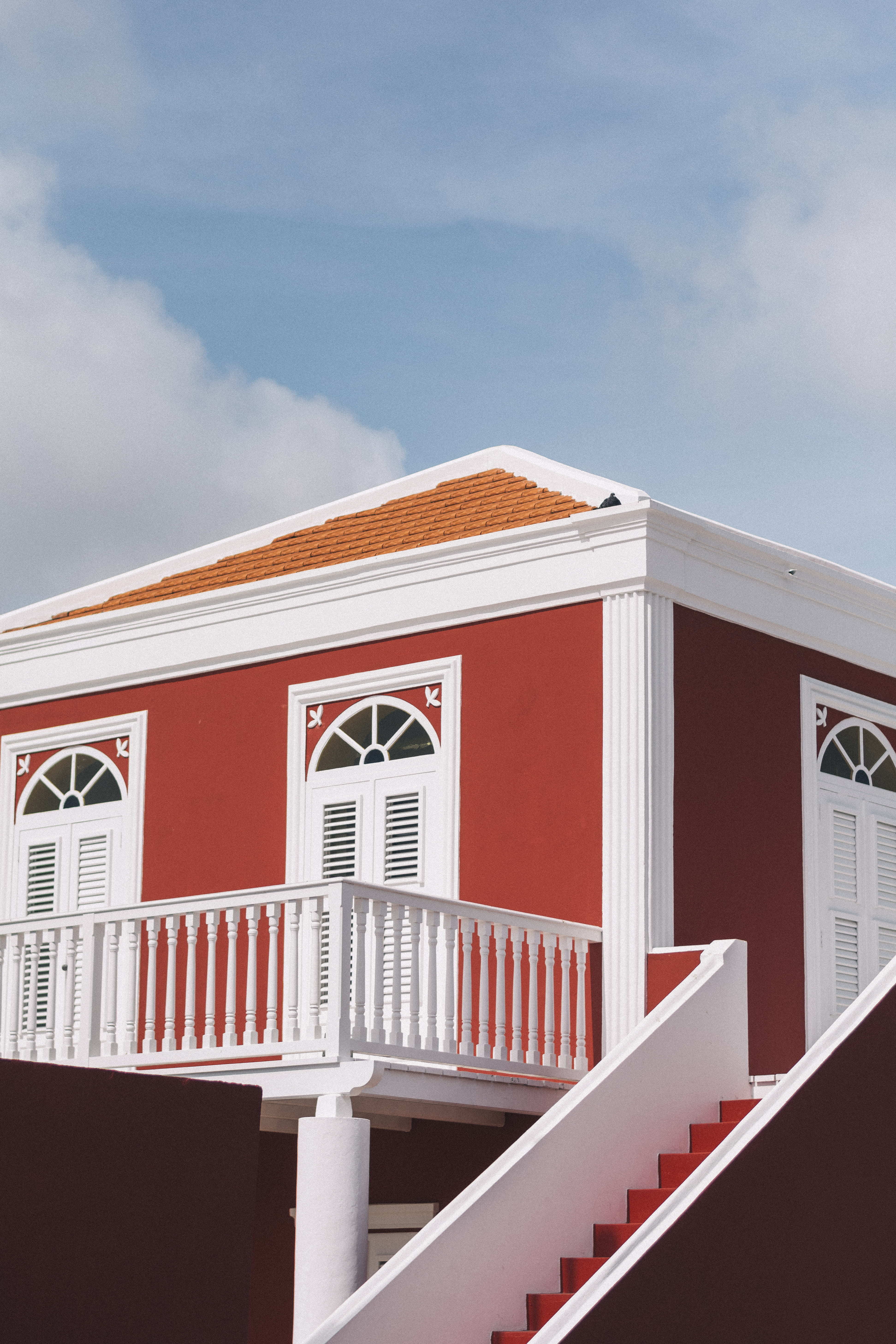 no People, blue, red house, brown, red, aruba, terrace, design, construction Industry, outdoors, uSA, red roof, sky, house exterior, building Exterior, Phone HD Wallpaper