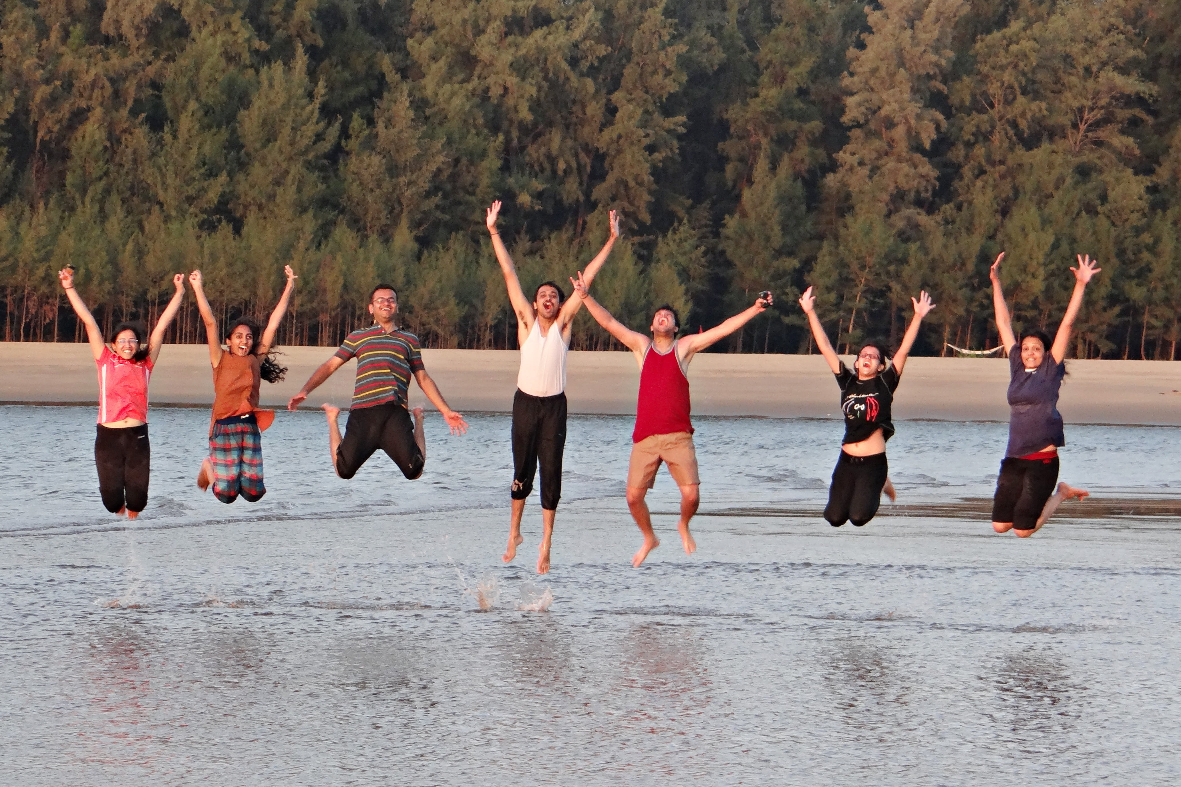 human arm, full length, jumping, day, group of people, happy people, frolic, human limb, men, group, adult, arabian sea, happy, beach, youngsters, women, HD Wallpaper