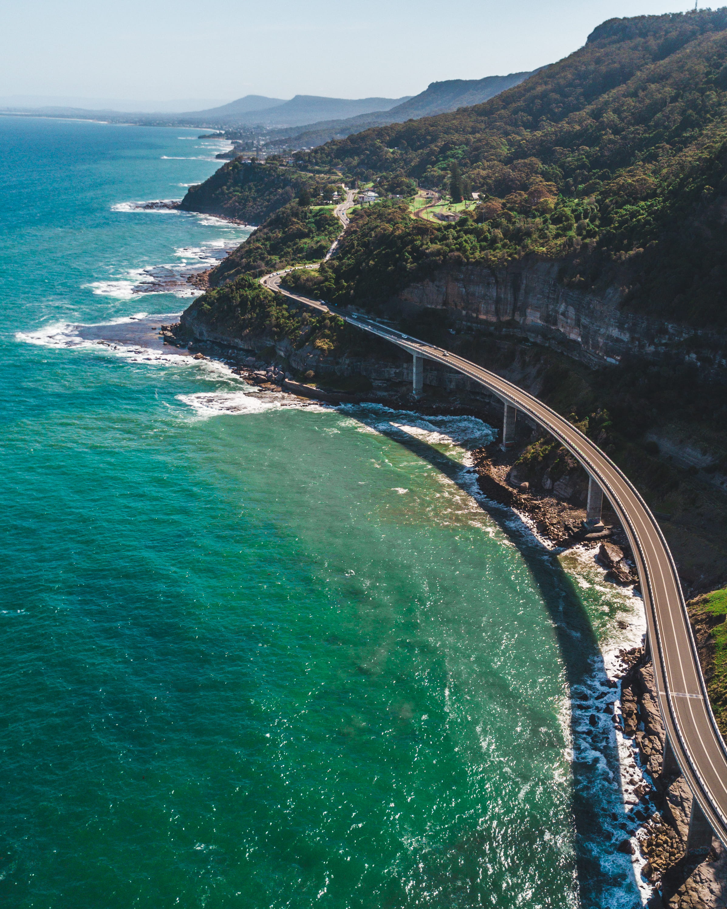 tranquility, sea, scenic, built structure, highway, idyllic, rocks, ocean, turquoise colored, mountains, mountain, outdoors, elevated, scenics - nature, Phone HD Wallpaper