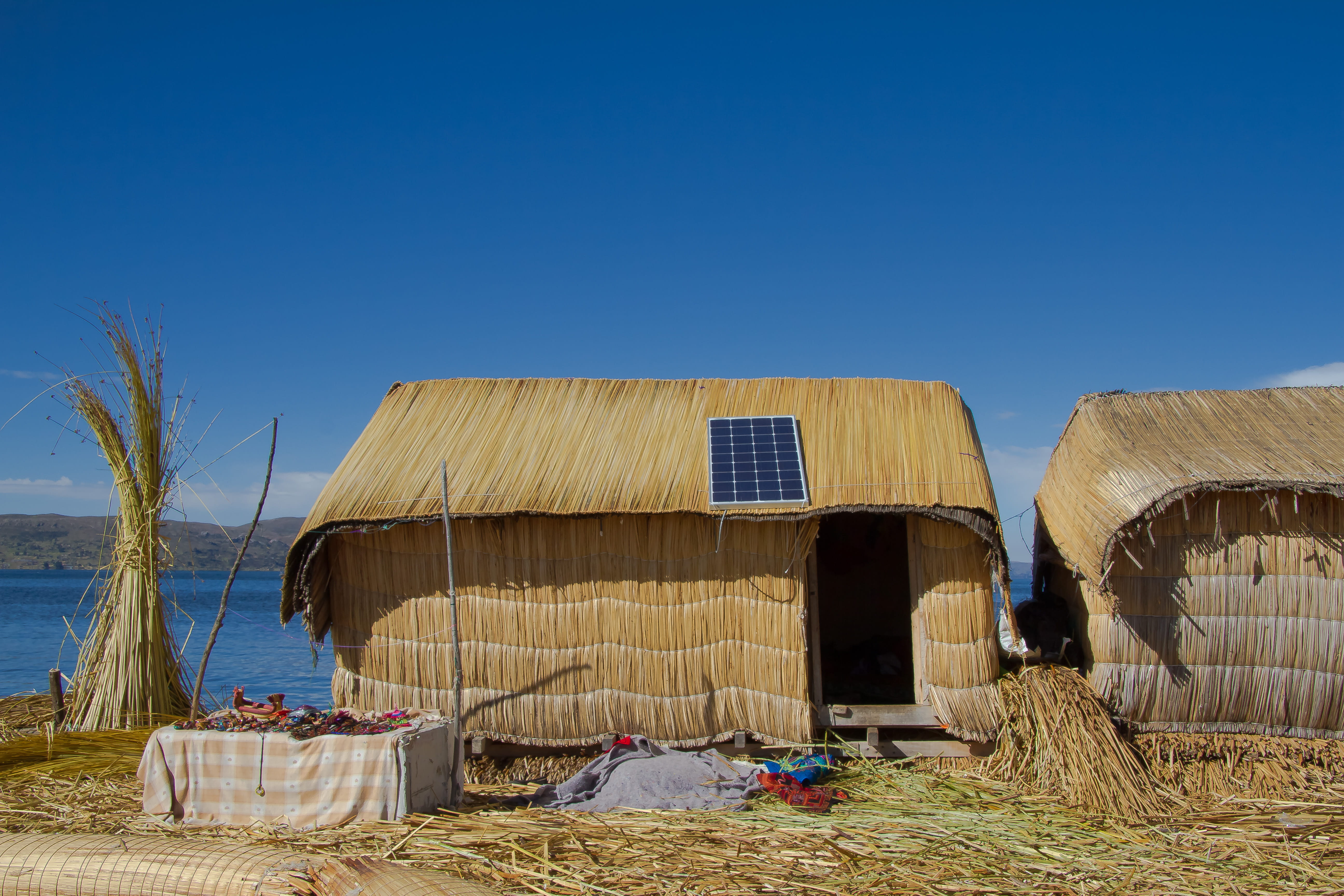 land, lake, nature, puno, built structure, sky, blue, building exterior, house, 5K, peru, architecture, abandoned, old, uros, island, beach, wood - material, HD Wallpaper