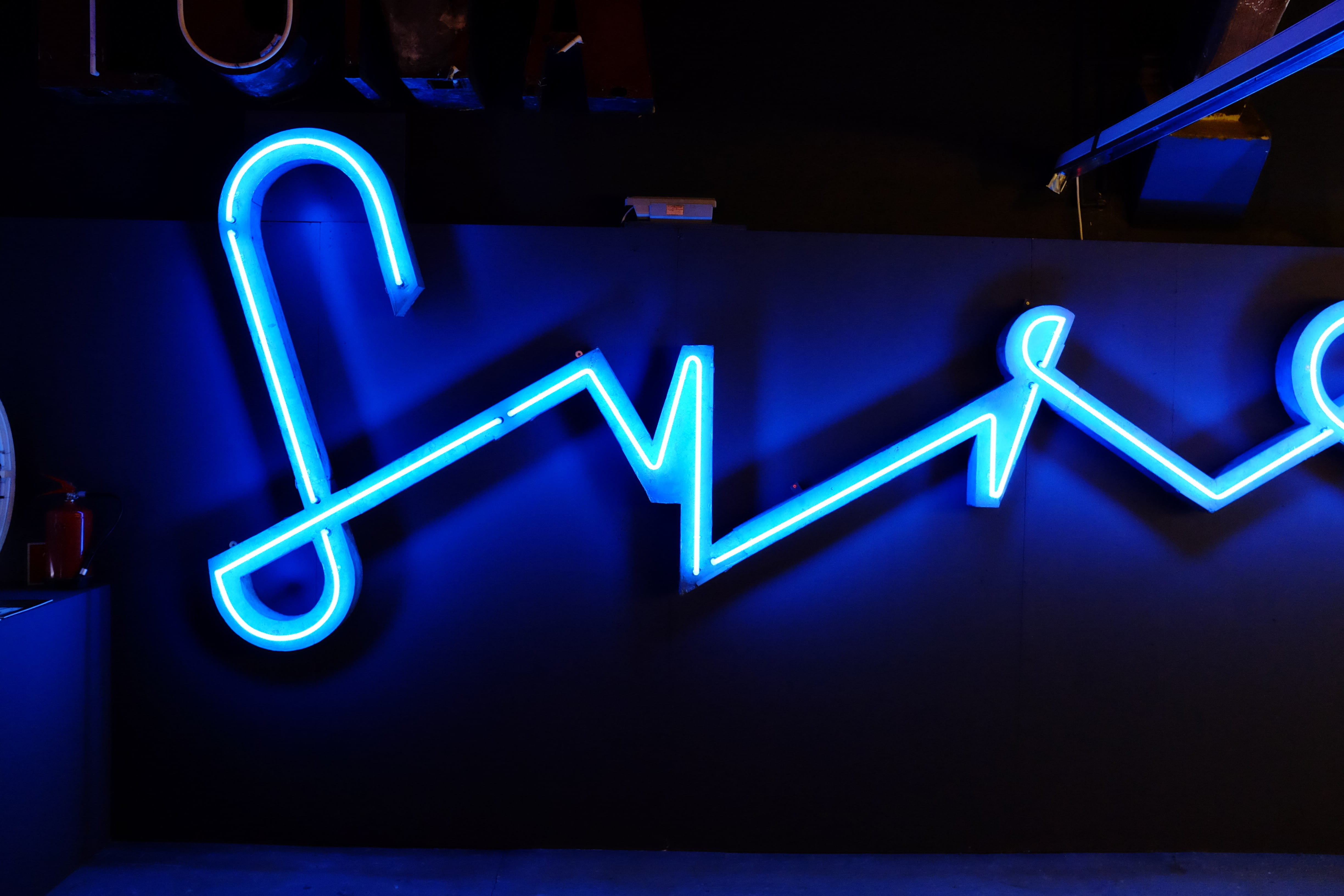 typography, glowing, capital letter, black background, electricity, western script, lighting equipment, direction, orthographic symbol, light - natural phenomenon, HD Wallpaper