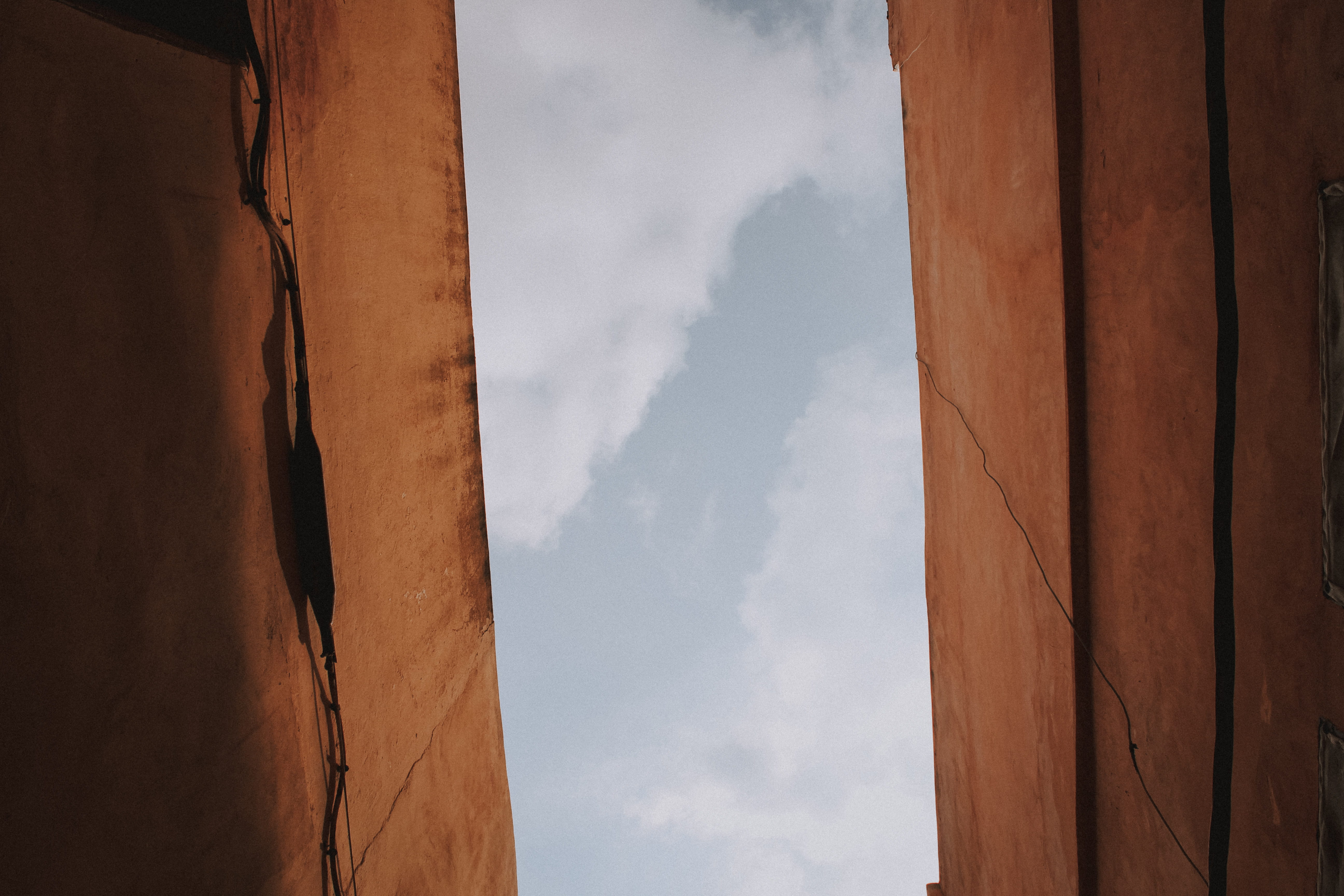 in between, 5K, street, history, day, built structure, urban, beauty in nature, medina, meknes, dreamy, sky view, backgrounds, morocco, orange, wood - material, HD Wallpaper