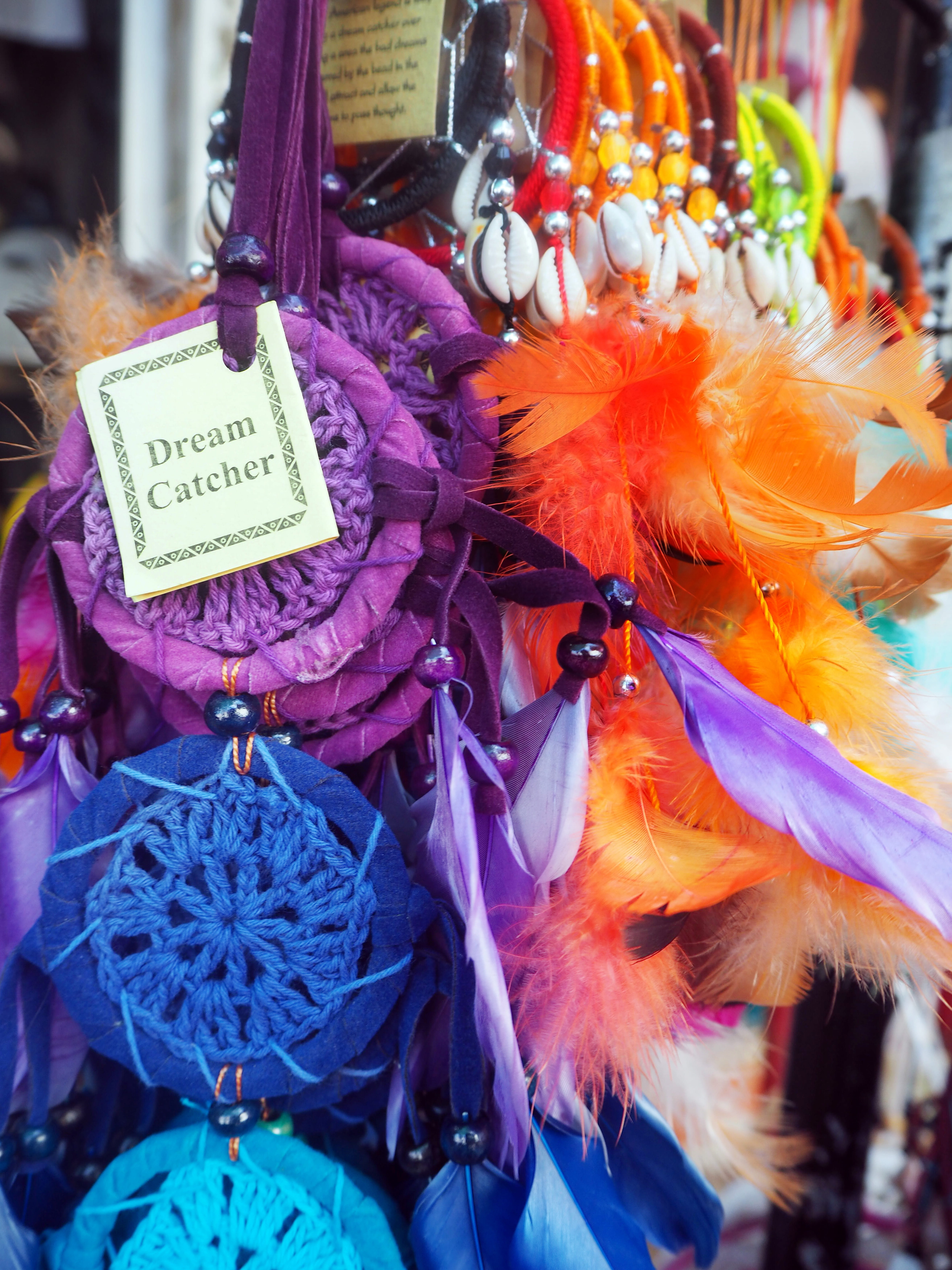 yarn, 5K, close-up, variation, costume, retail, scarf, choice, pinata, parade, carnival, purple, multi colored, hanging, sale, text, market, crowd, flowering plant, Phone HD Wallpaper