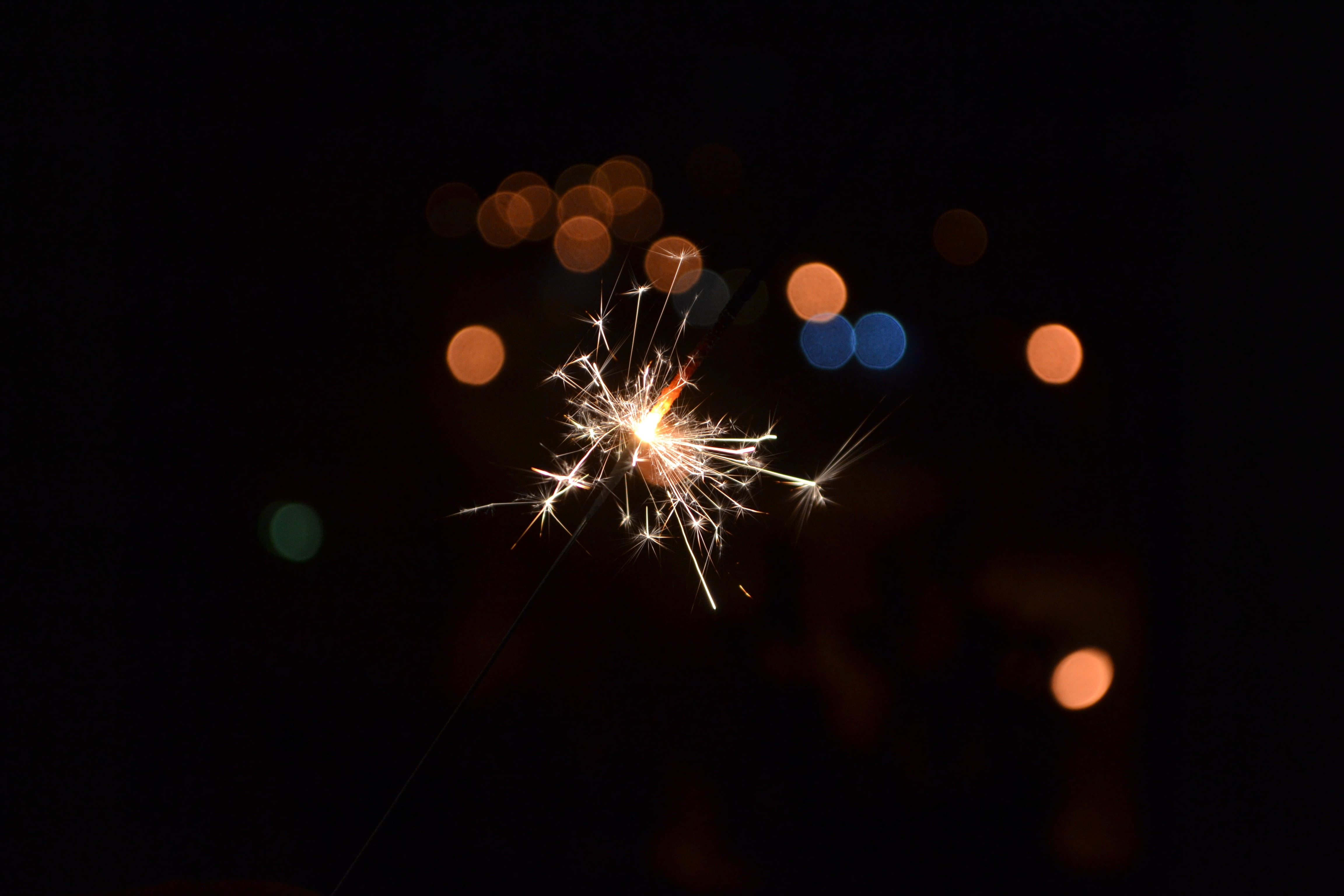 holiday, long exposure, person, light, spark, black background, blurred motion, firecracker, new years eve, arts culture and entertainment, glowing, motion, HD Wallpaper