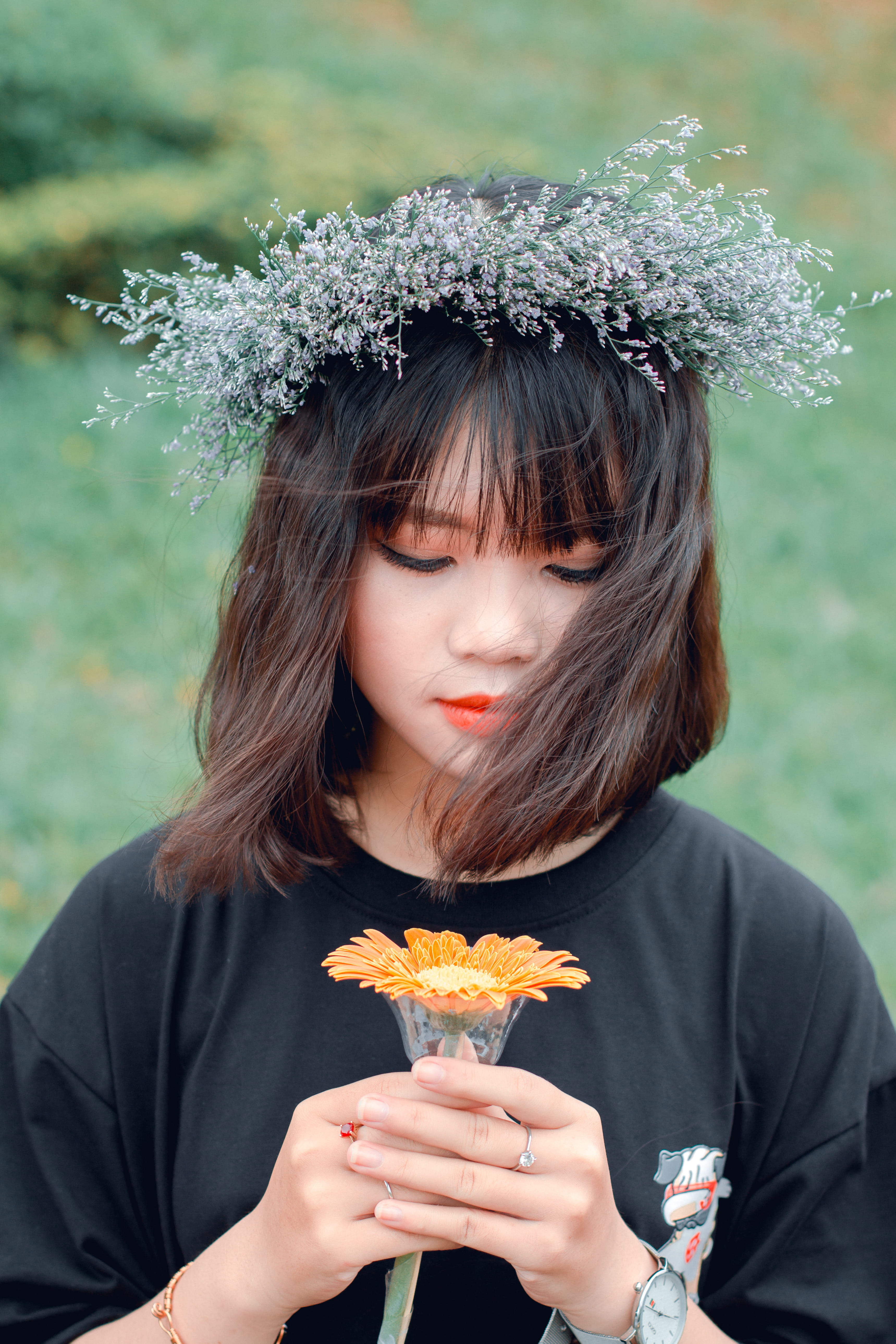 outdoors, women, bangs, front view, one person, fashion, females, gerbera, food and drink, pretty, casual clothing, holding, blurred background, flower, Phone HD Wallpaper