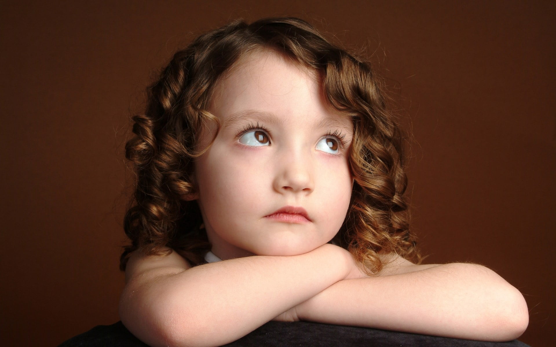 baby, hairstyle, portrait, girl, rolling, indoors, front view, beautyful, headshot, cute, childhood, sadness, one person, 1080P, innocence, brown background, HD Wallpaper