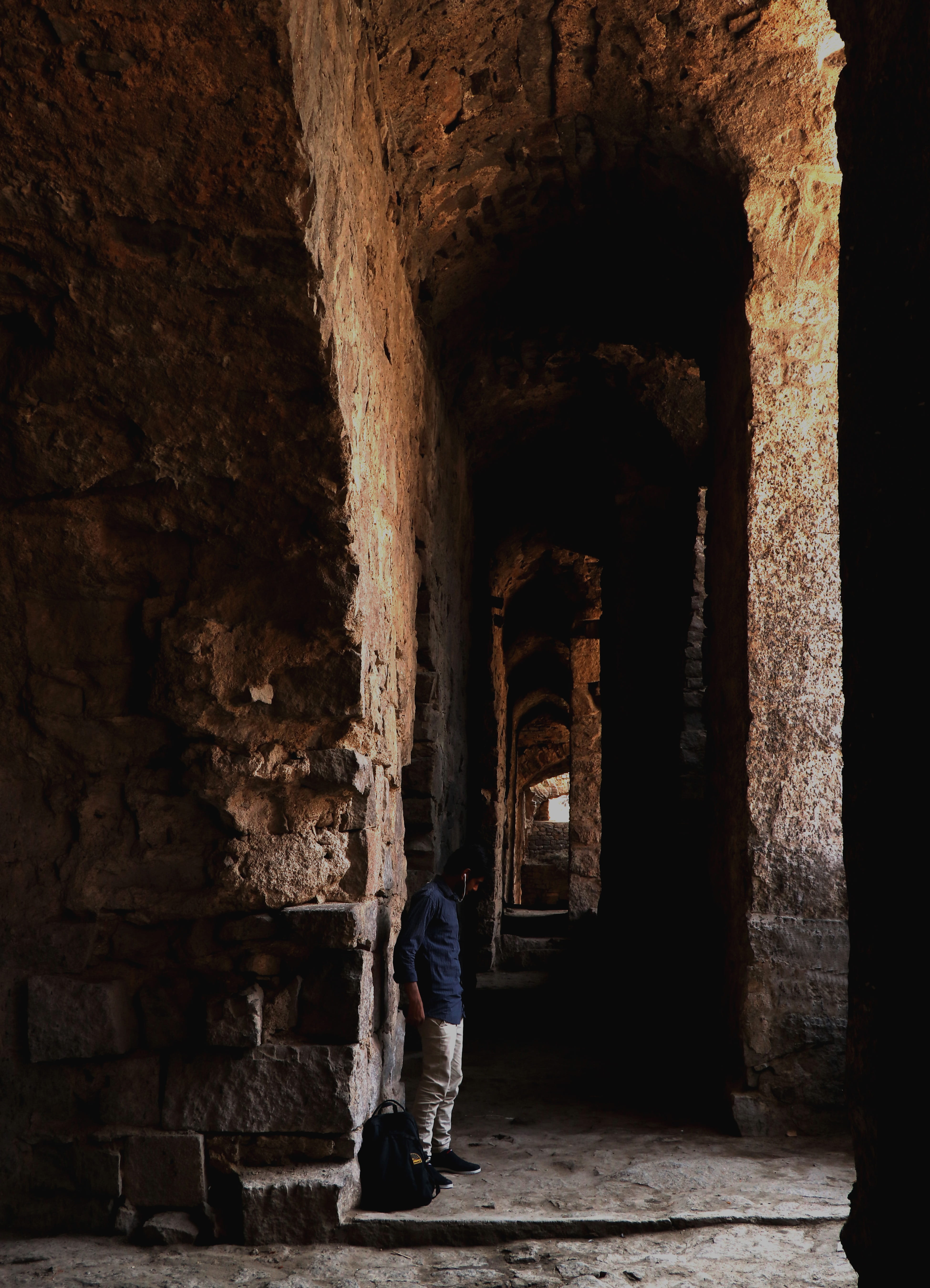 5K, day, adult, india, real people, built structure, rear view, arch, building exterior, the past, old, golconda fort, architectural column, one person, Phone HD Wallpaper