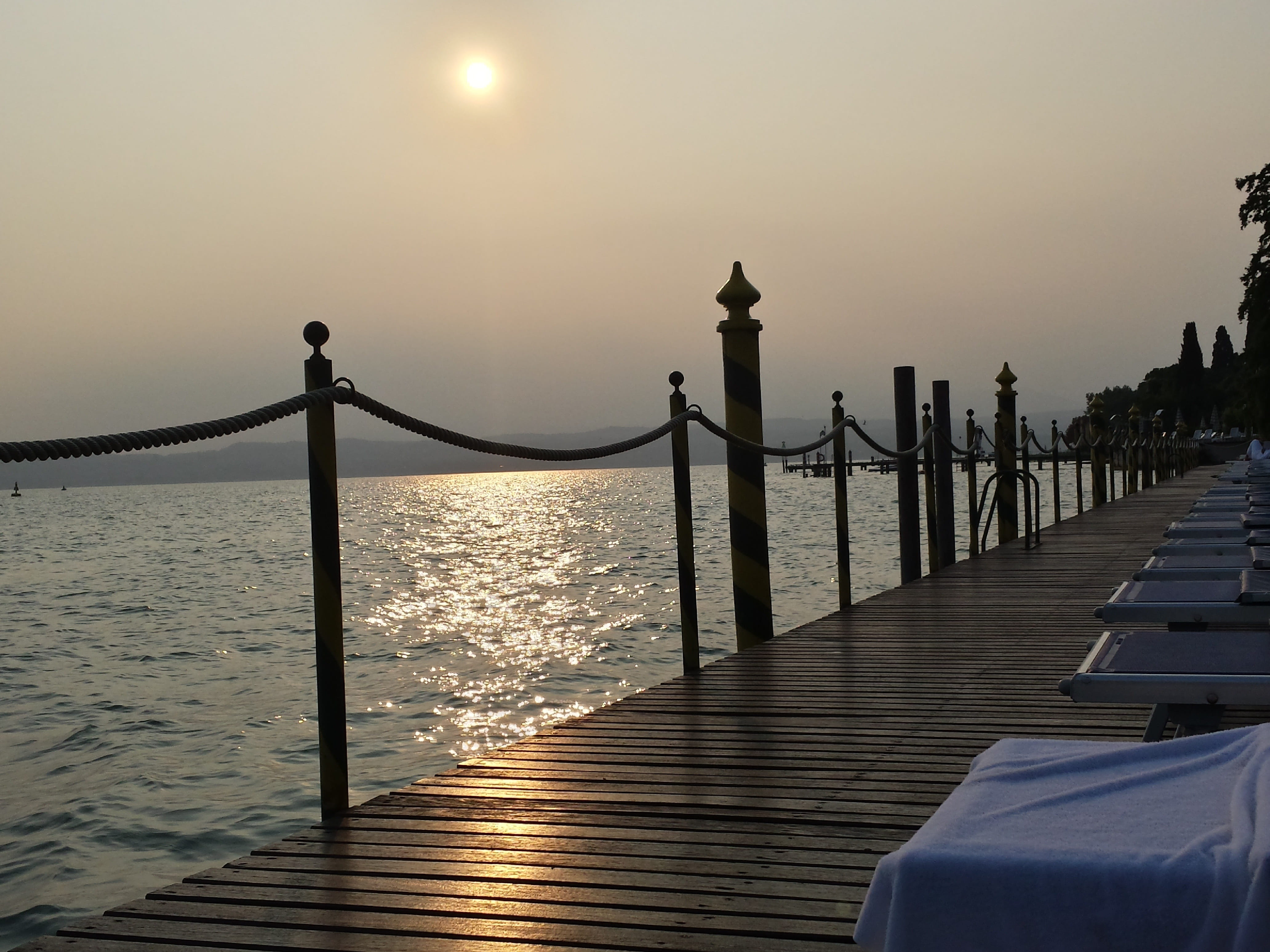 diminishing perspective, Sirmione, wood - material, pier, tranquility, transportation, railing, vacations, architecture, sunsets, incidental people, sun, HD Wallpaper