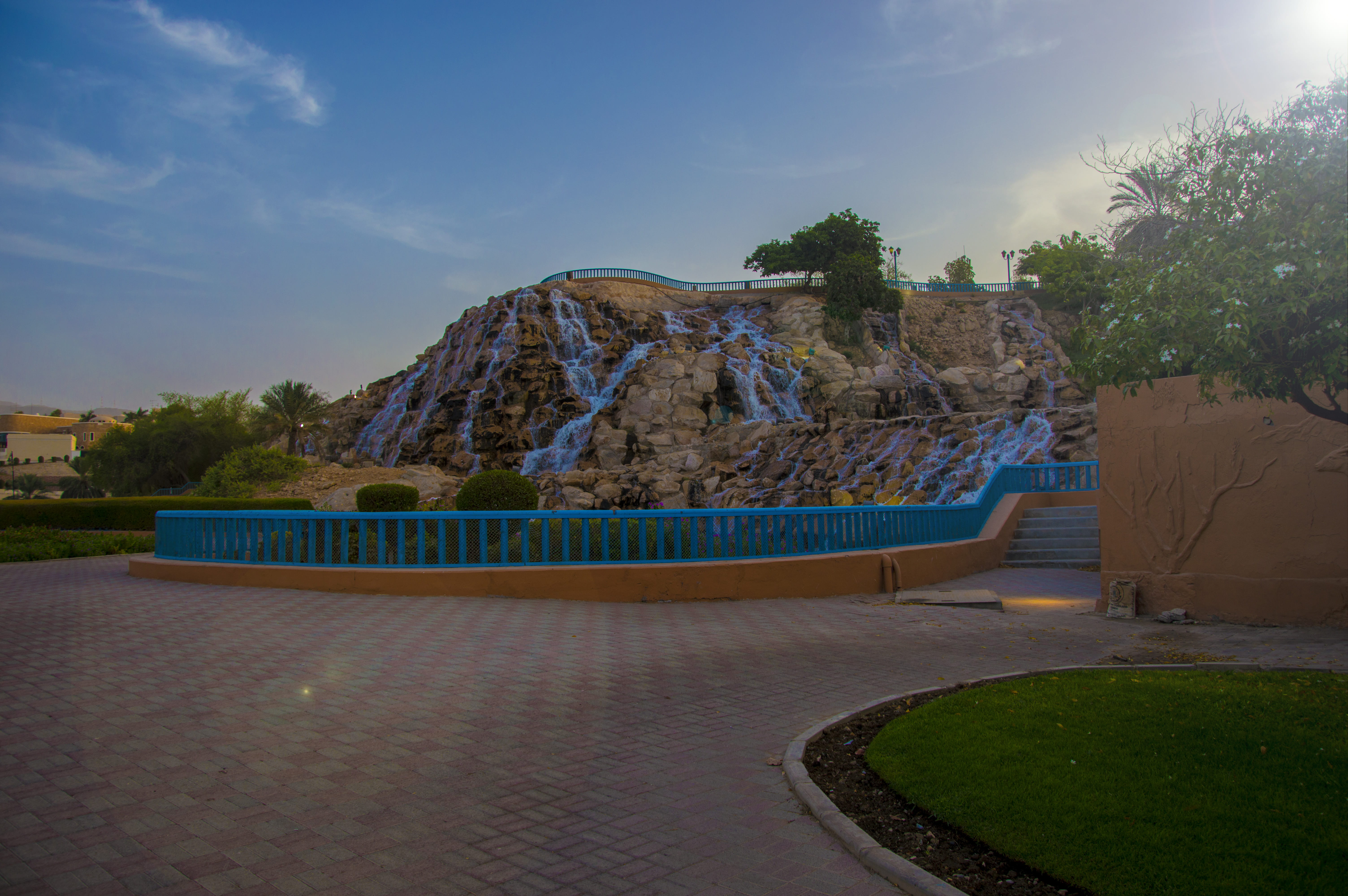 travel, mountain, tranquility, beauty in nature, day, park, waterfall, water, qurm, nature, blue, cloud - sky, muscat, building exterior, 5K, built structure, HD Wallpaper