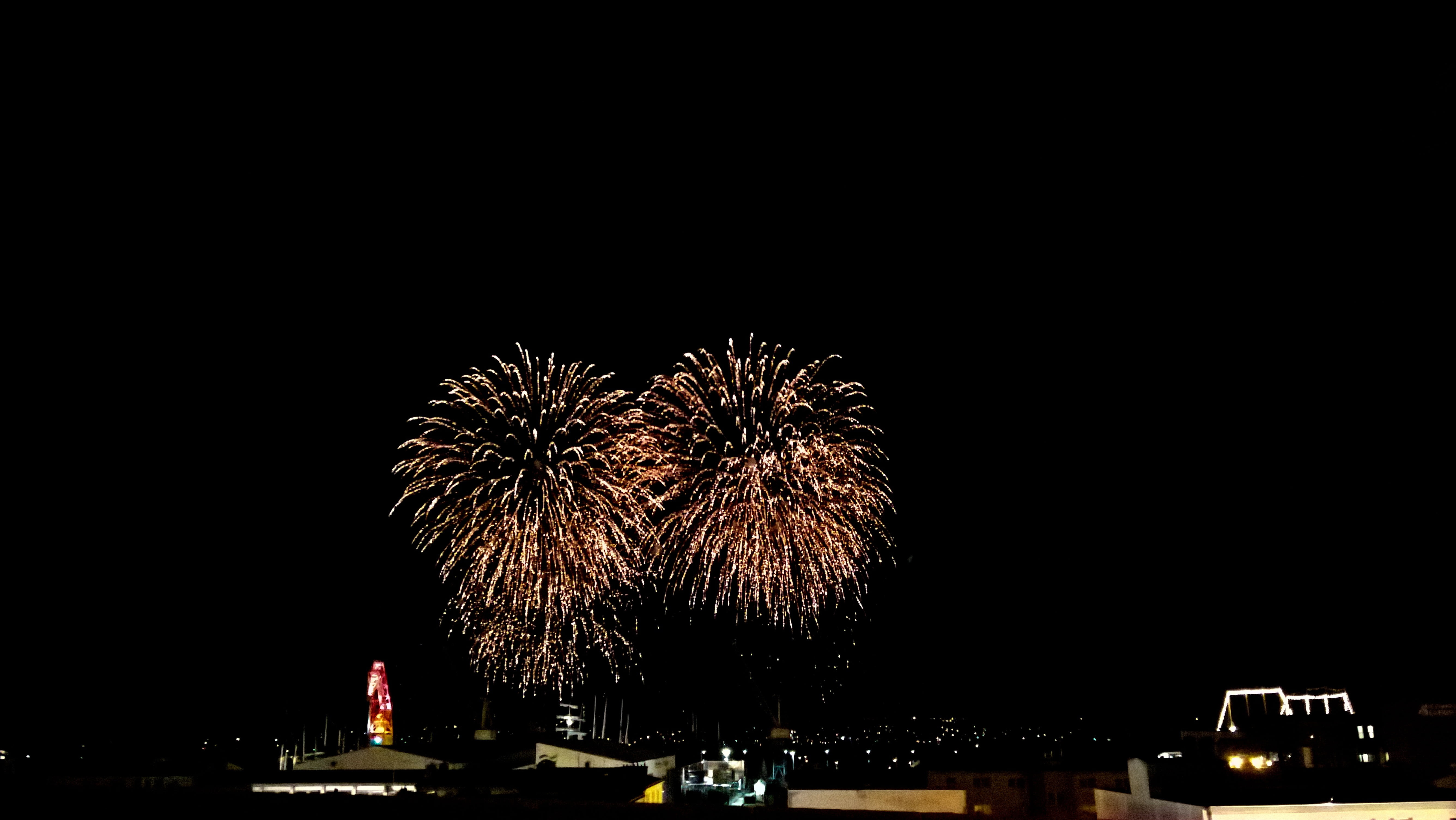 low angle view, illuminated, glowing, brittany, city, cityscape, firework Display, holiday, exploding, no people, sparks, bay of brest, long exposure, outdoors, HD Wallpaper