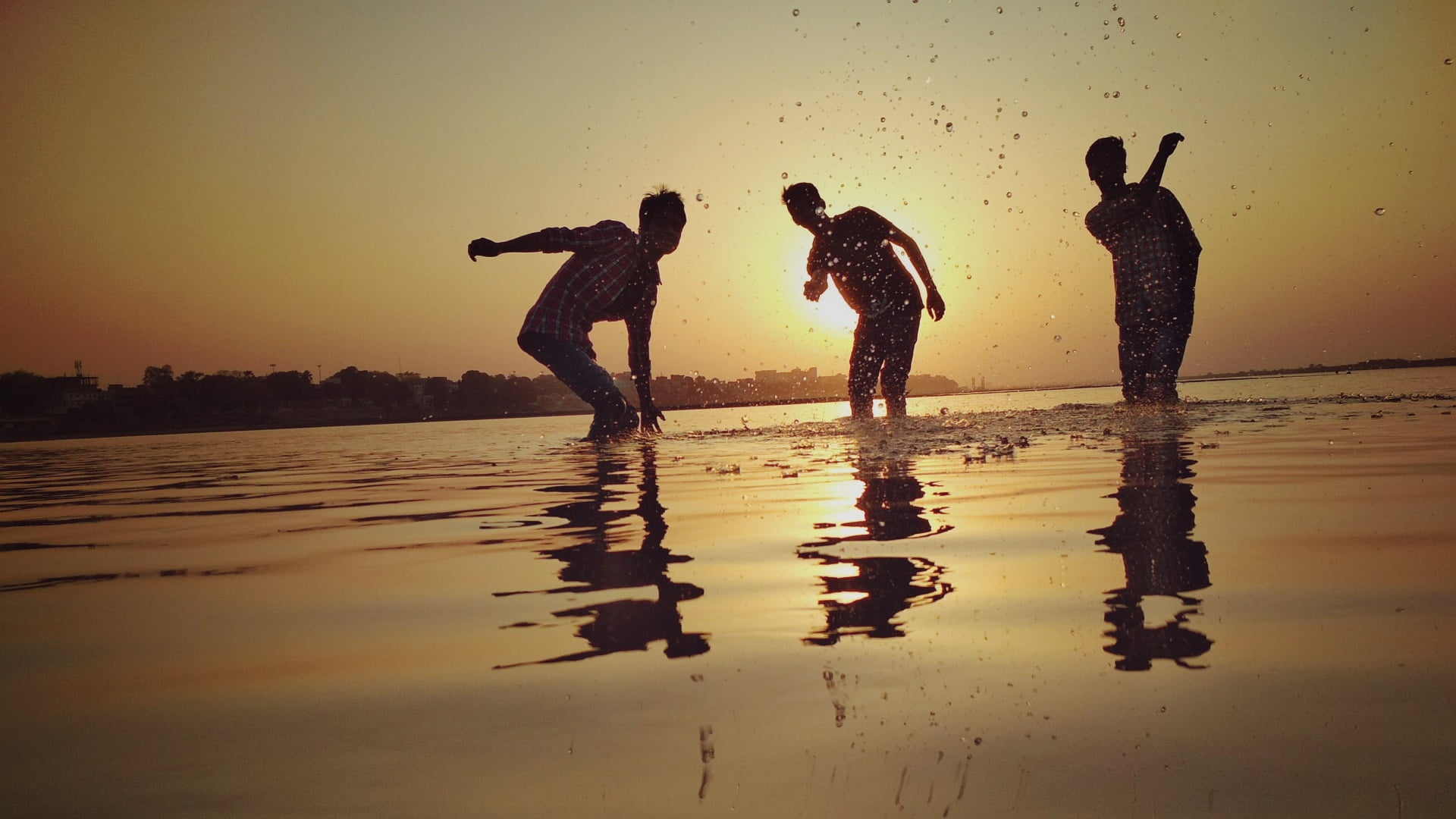 patna, wet, standing, silhouette, nature, togetherness, sunset, lifestyles, water, fun, beach, friends, sea, real people, river, sky, reflection, outdoors, HD Wallpaper