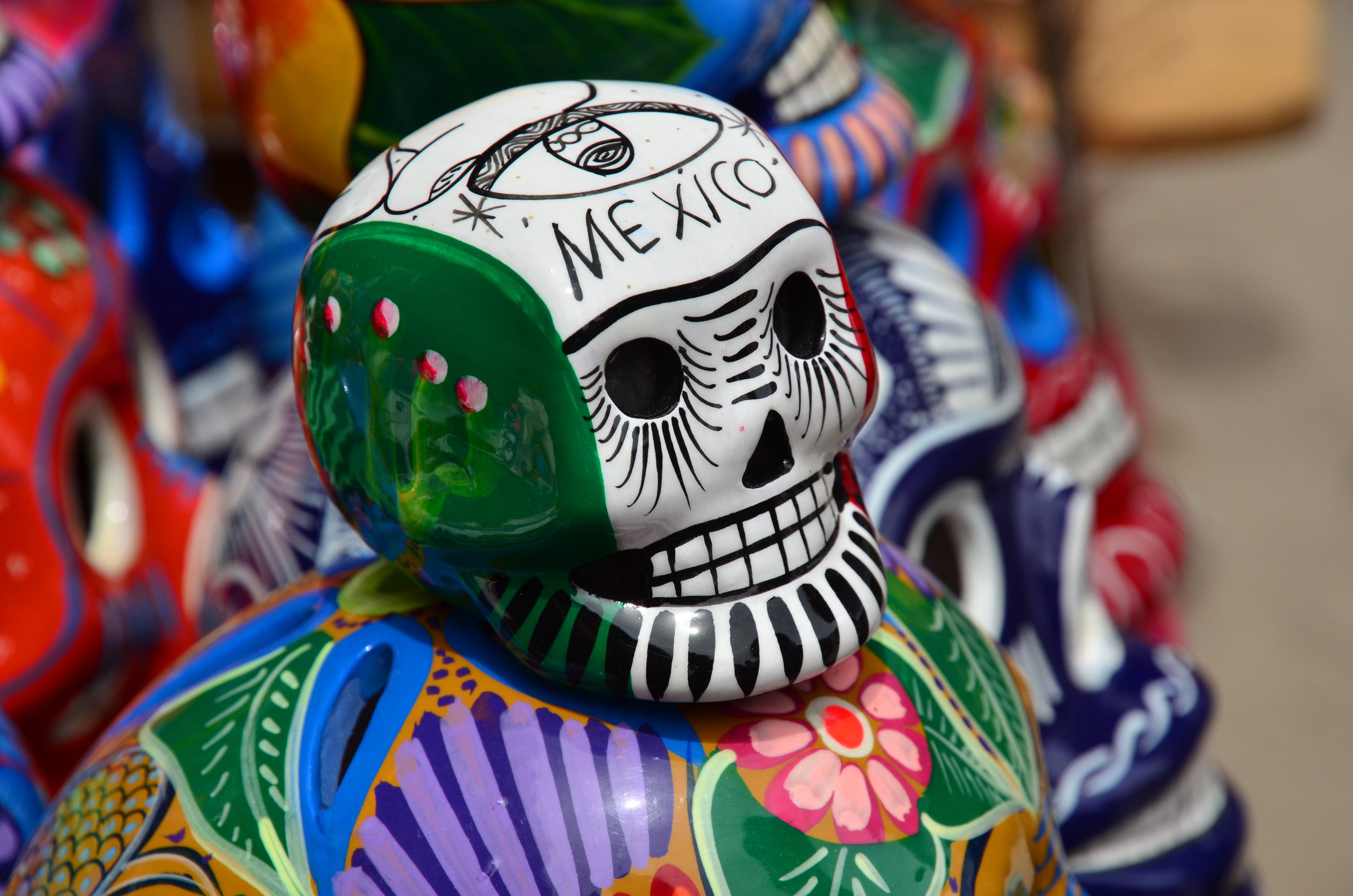 retail, 4K, day, white, Skull, representation, indoors, Flag, photography, green, souvenir, headwear, craft, figurine, celebration, Mexico, focus on foreground, HD Wallpaper