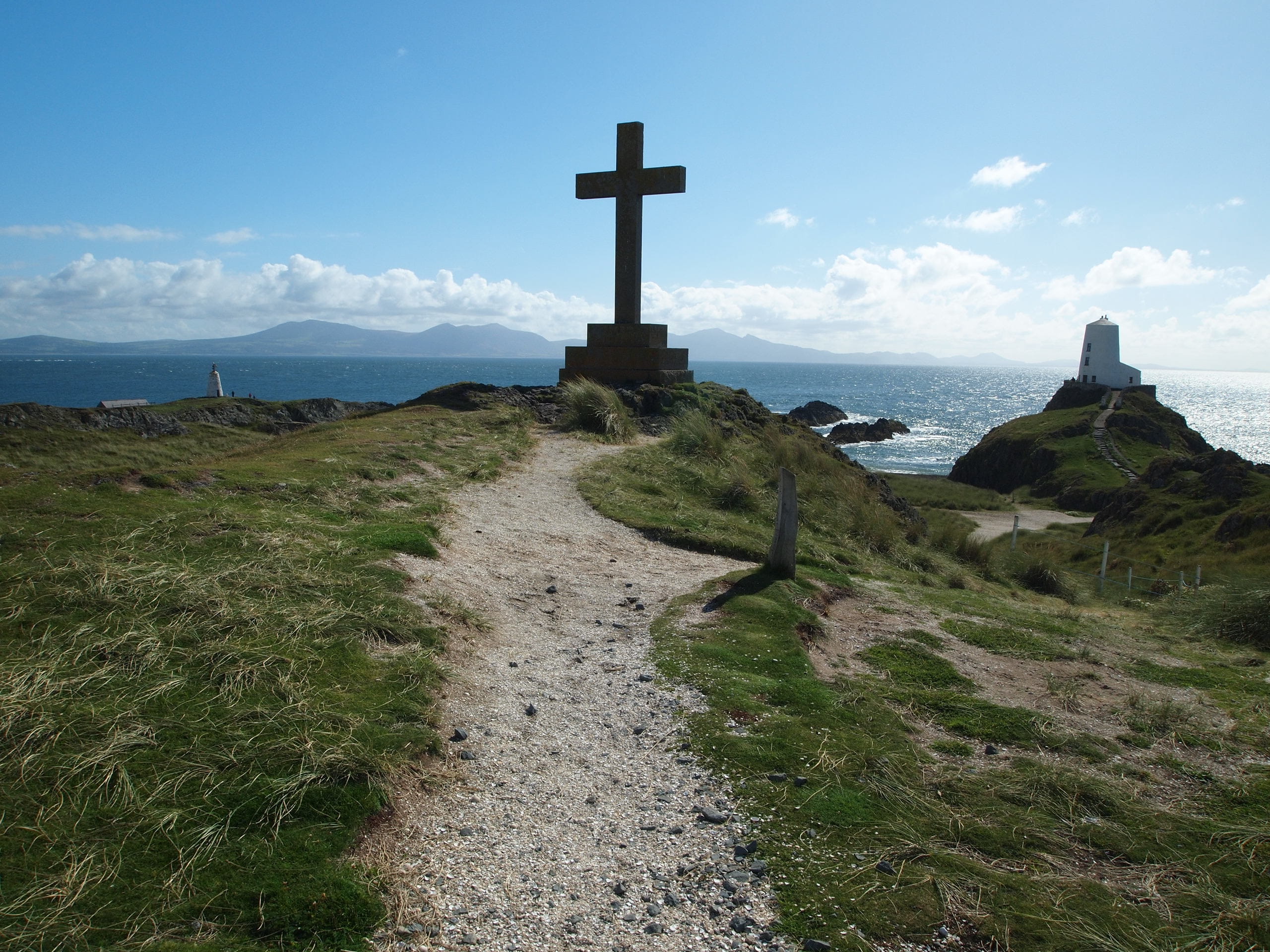 grass, coastal, wall, outdoors, sea, coast, day, built structure, religion, white, anglesey, llanddwyn, architecture, water, sunny, nature, tranquil scene, HD Wallpaper