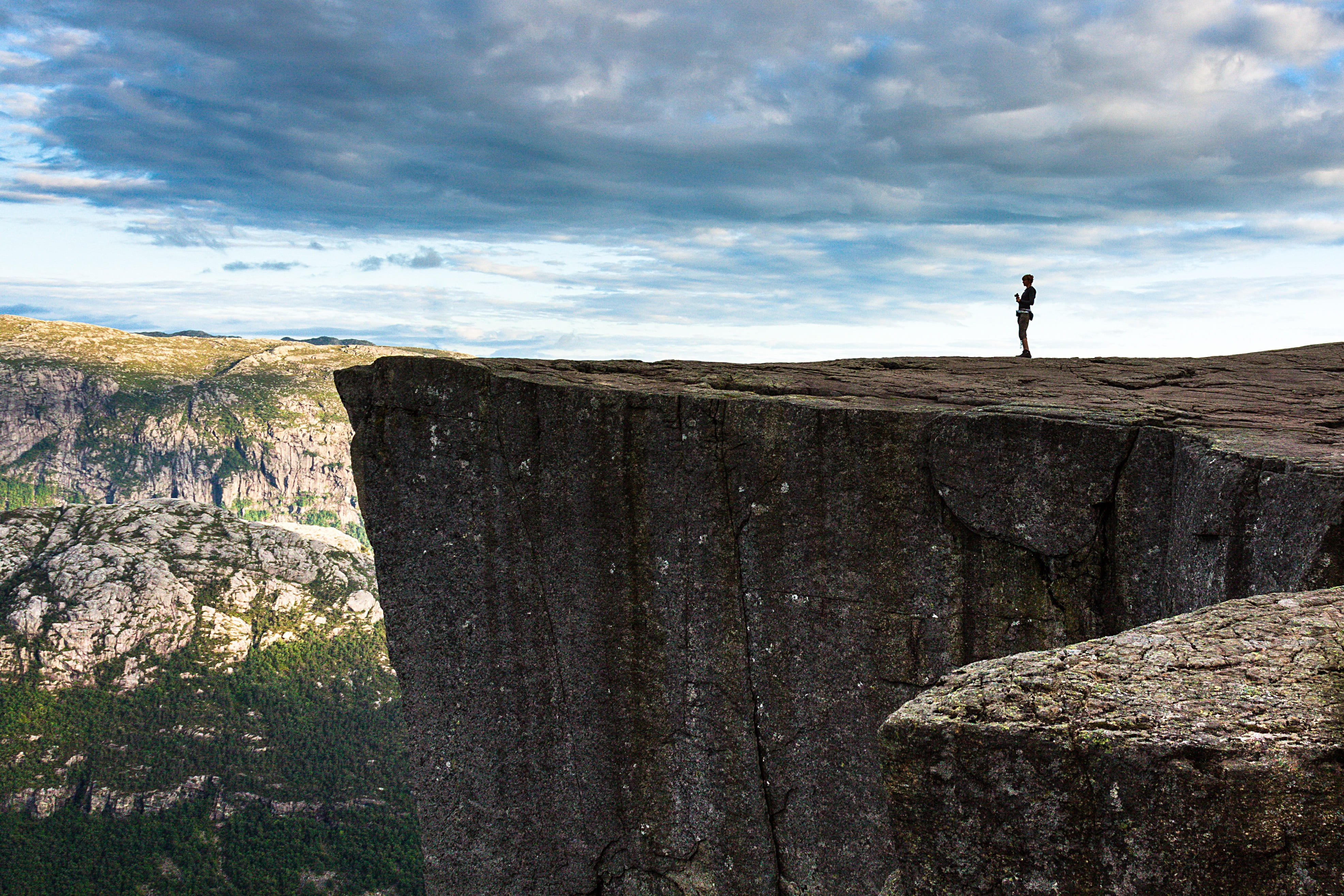 sky, tranquil scene, natural, cloud - sky, 4K, outdoors, mountain, one person, land, leisure activity, beauty in nature, preikestolen, space, rock - object, HD Wallpaper