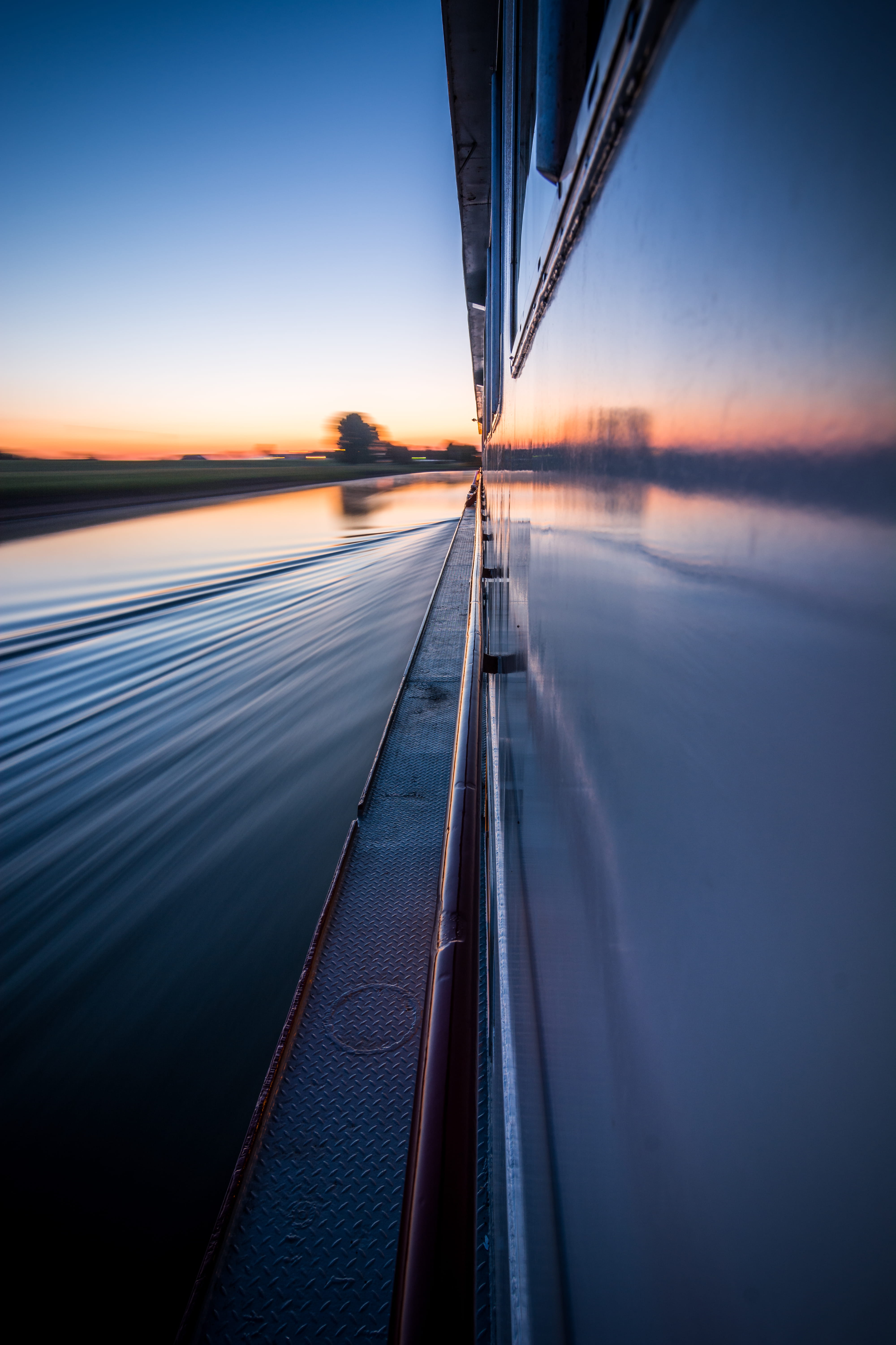 brown, cue, no people, diminishing perspective, sea, mode of transportation, wooden, transportation, dawn, blurred motion, nature, speed, dusk, orange color, Phone HD Wallpaper
