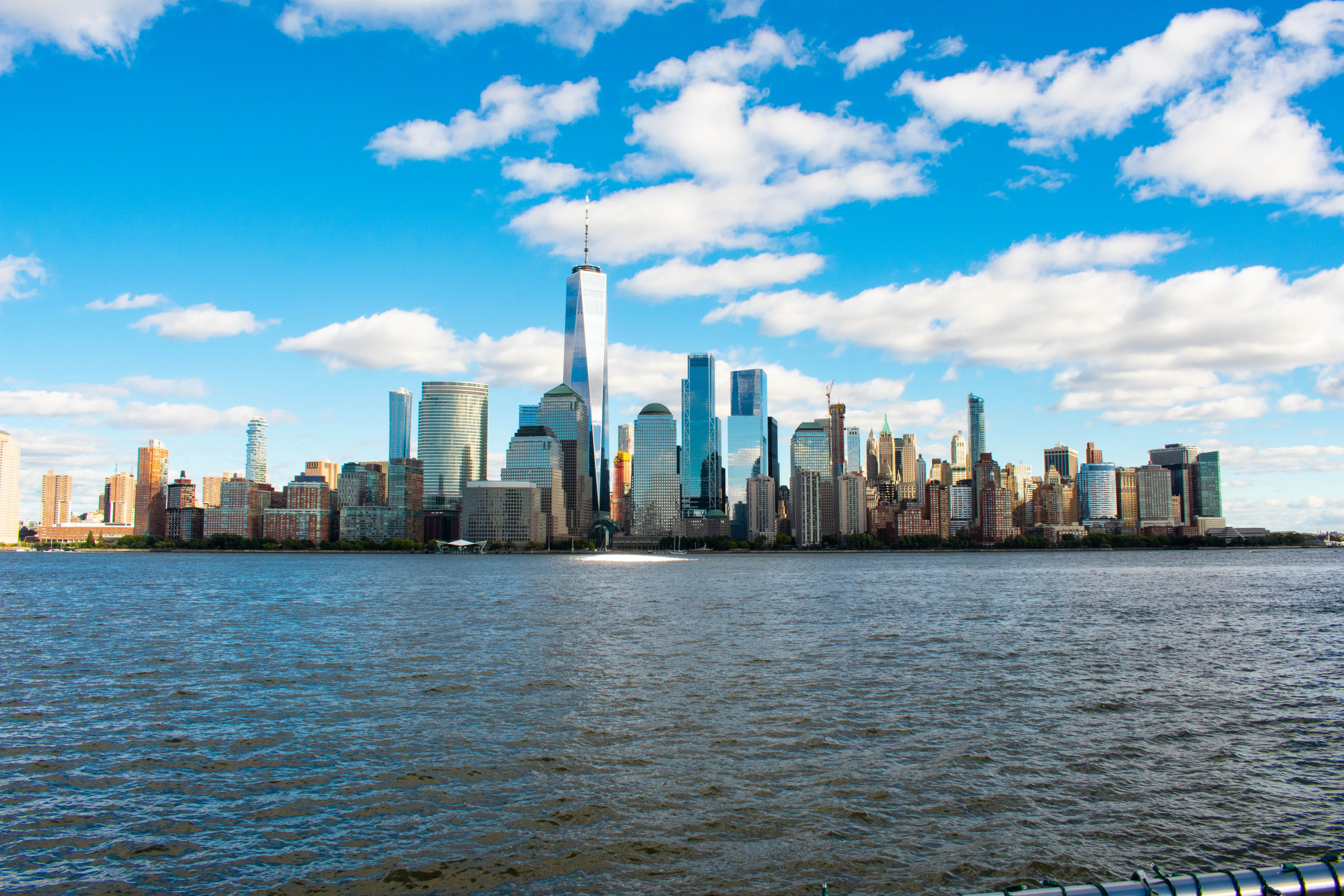 new york skyline, water, tower, day, no people, outdoors, newyork, famous places, spire, city, architecture, skyscraper, iconic landmarks, urban skyline, HD Wallpaper