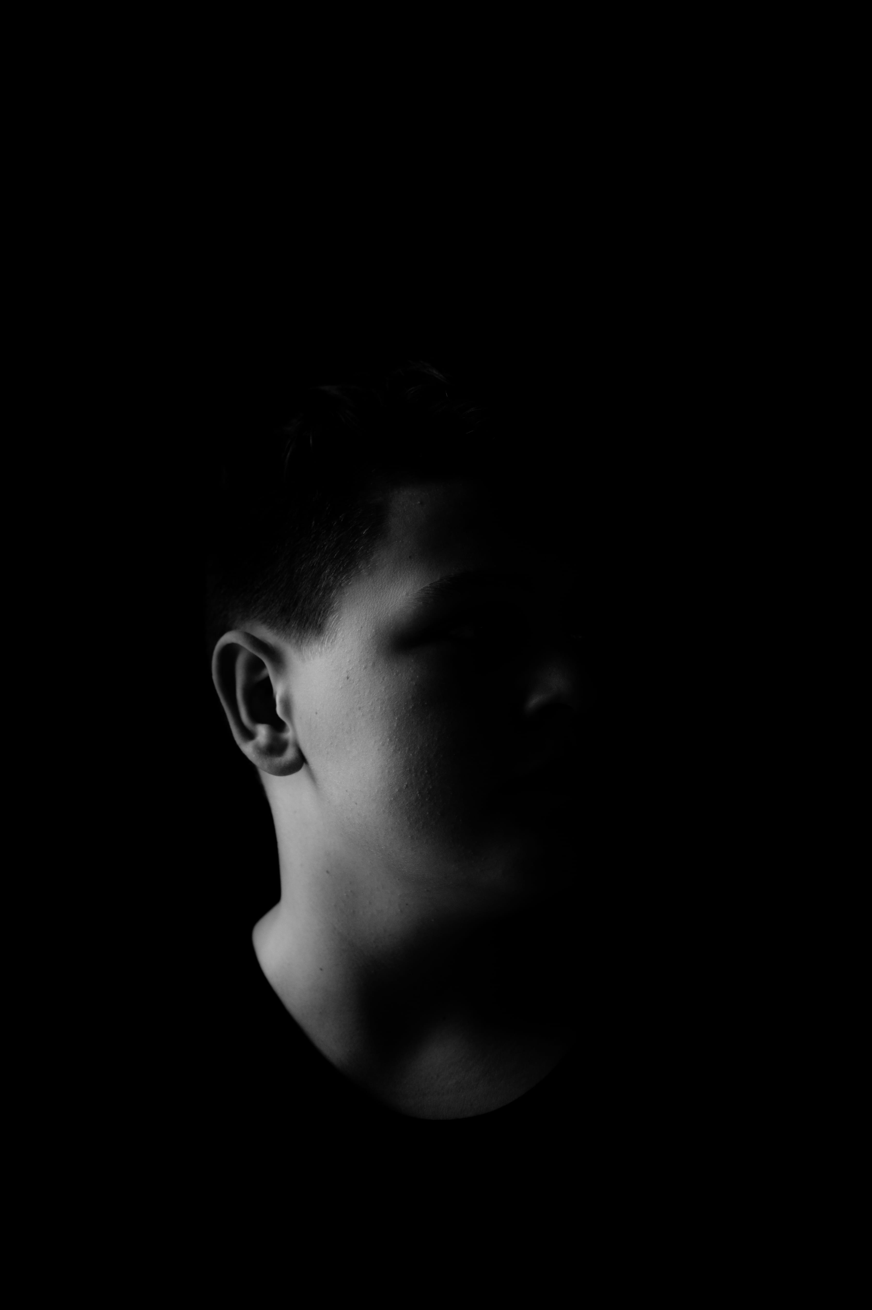 hair, young adult, contemplation, person, indoors, s, child, human, light, darkness, portrait, skin, copy space, 5K, baby, man, d850, teenage boys, head, Phone HD Wallpaper