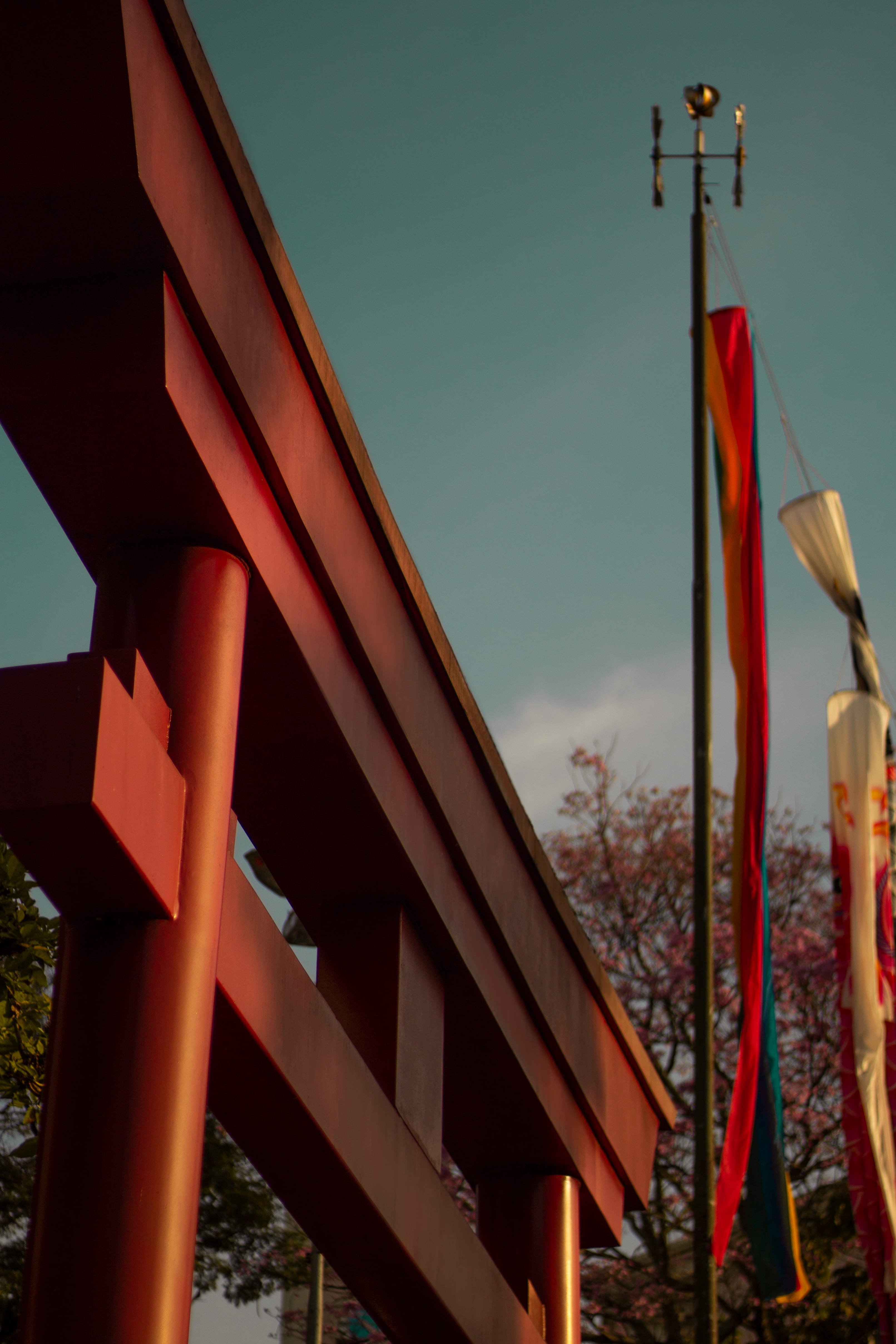 focus on foreground, bridge, day, portal, connection, outdoors, mobile, red, religion, architecture, cloud - sky, spirituality, flag, Phone HD Wallpaper