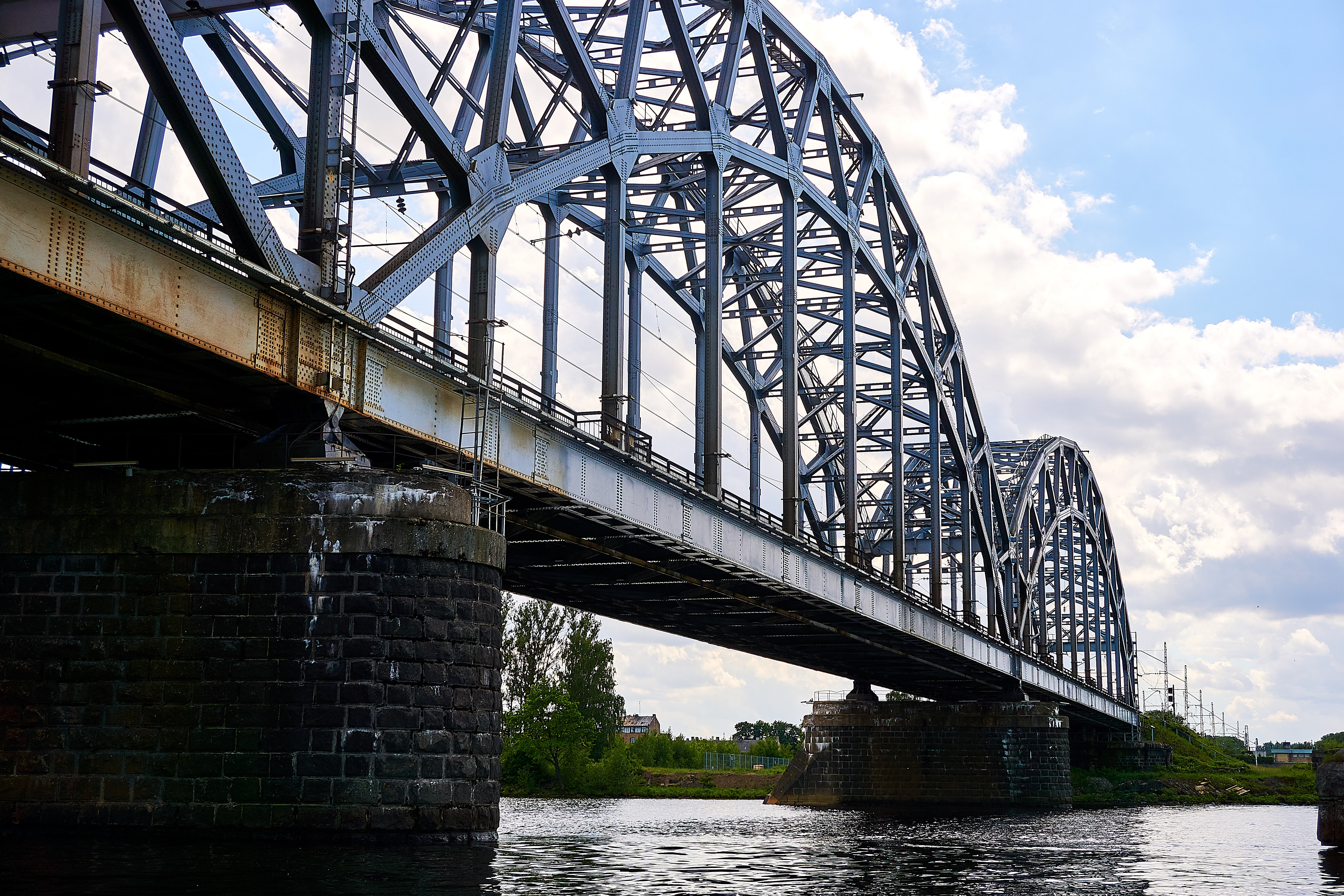 riga, transportation, water, architecture, industry, travel destinations, arch bridge, low angle view, cloud - sky, connection, waterfront, sky, outdoors, HD Wallpaper