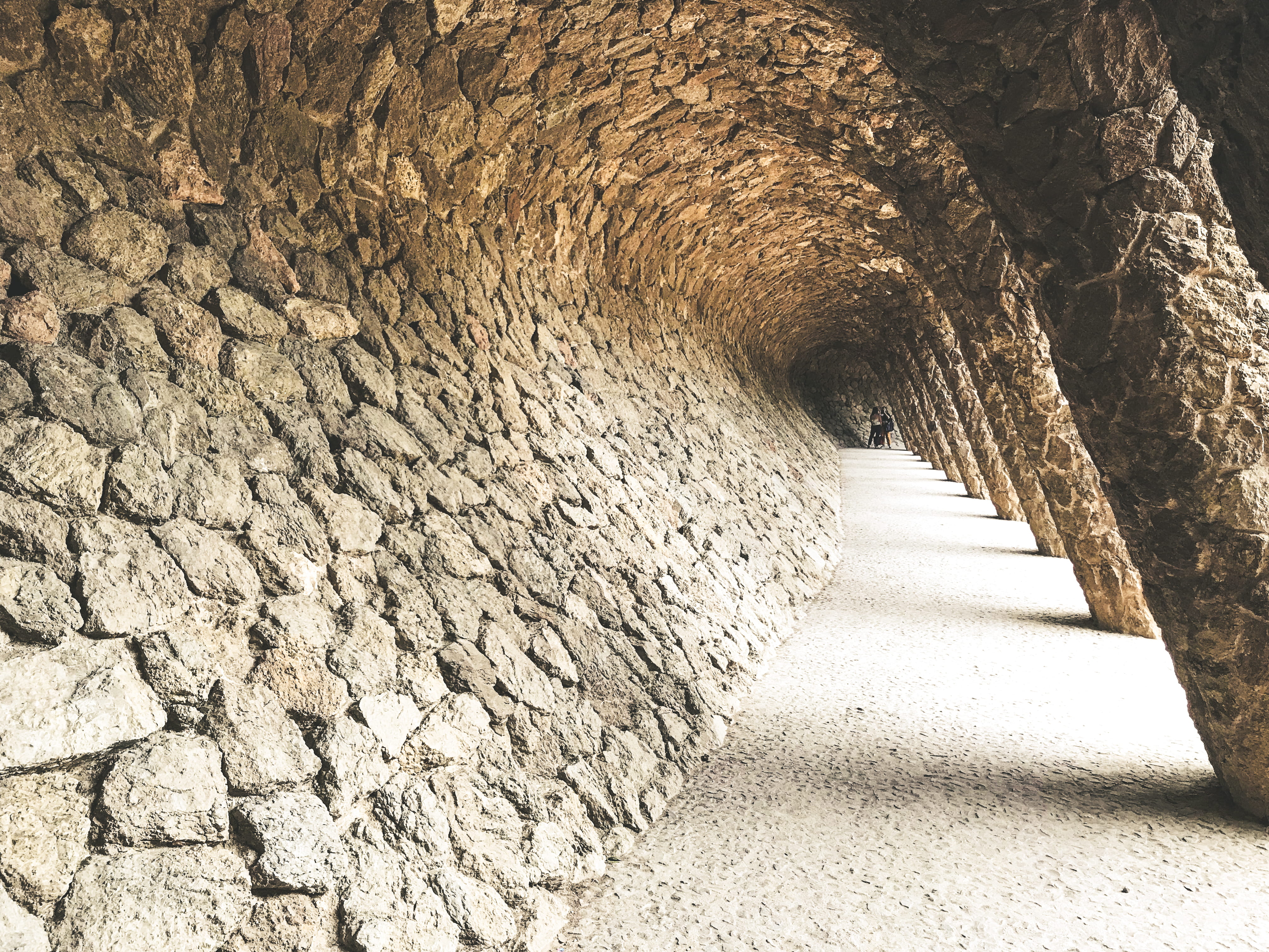 stone work, vanishing point, rock, built structure, wall - building feature, lines, ancient civilization, the way forward, direction, park guell, architecture, HD Wallpaper