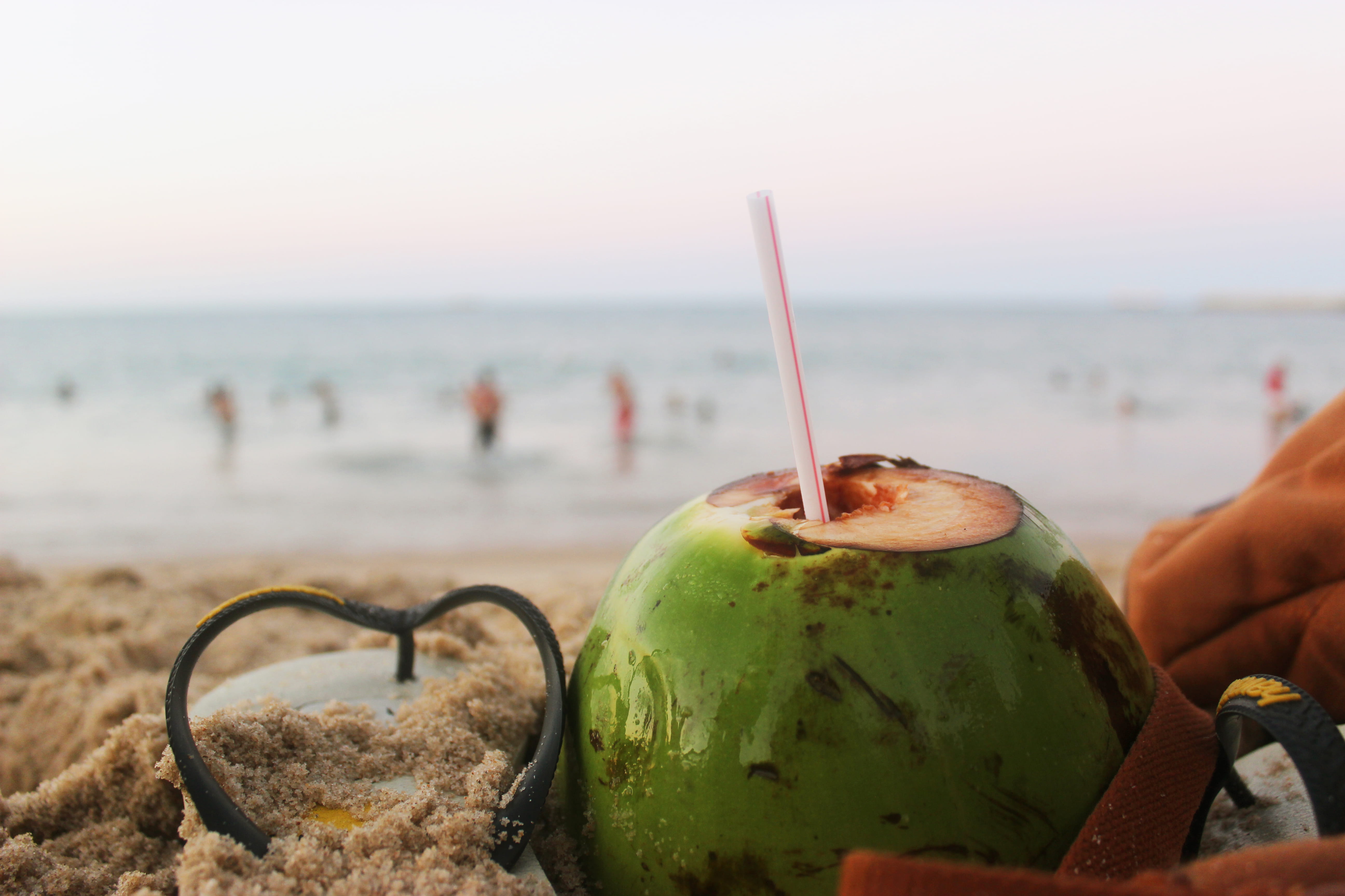 ceara, cocktail, focus on foreground, blurred, sand, freshness, people, horizon over water, horizon line, 5K, coconut, one person, food and drink, land, HD Wallpaper