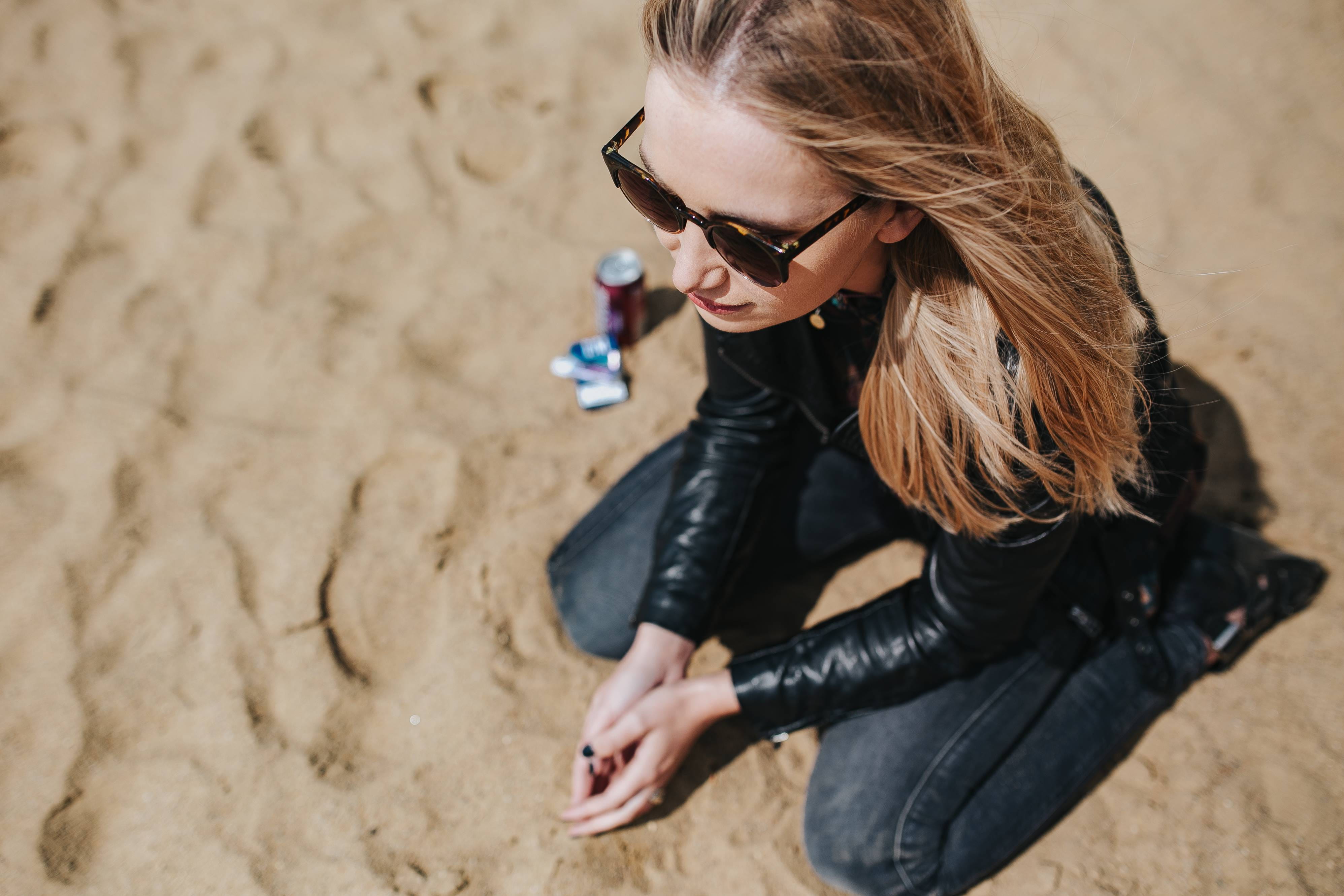 sand, relaxing, 4K, beautiful woman, glasses, adult, caucasian Ethnicity, leather jacket, women, leather, beauty, teenager, fashion, young, young adult, HD Wallpaper