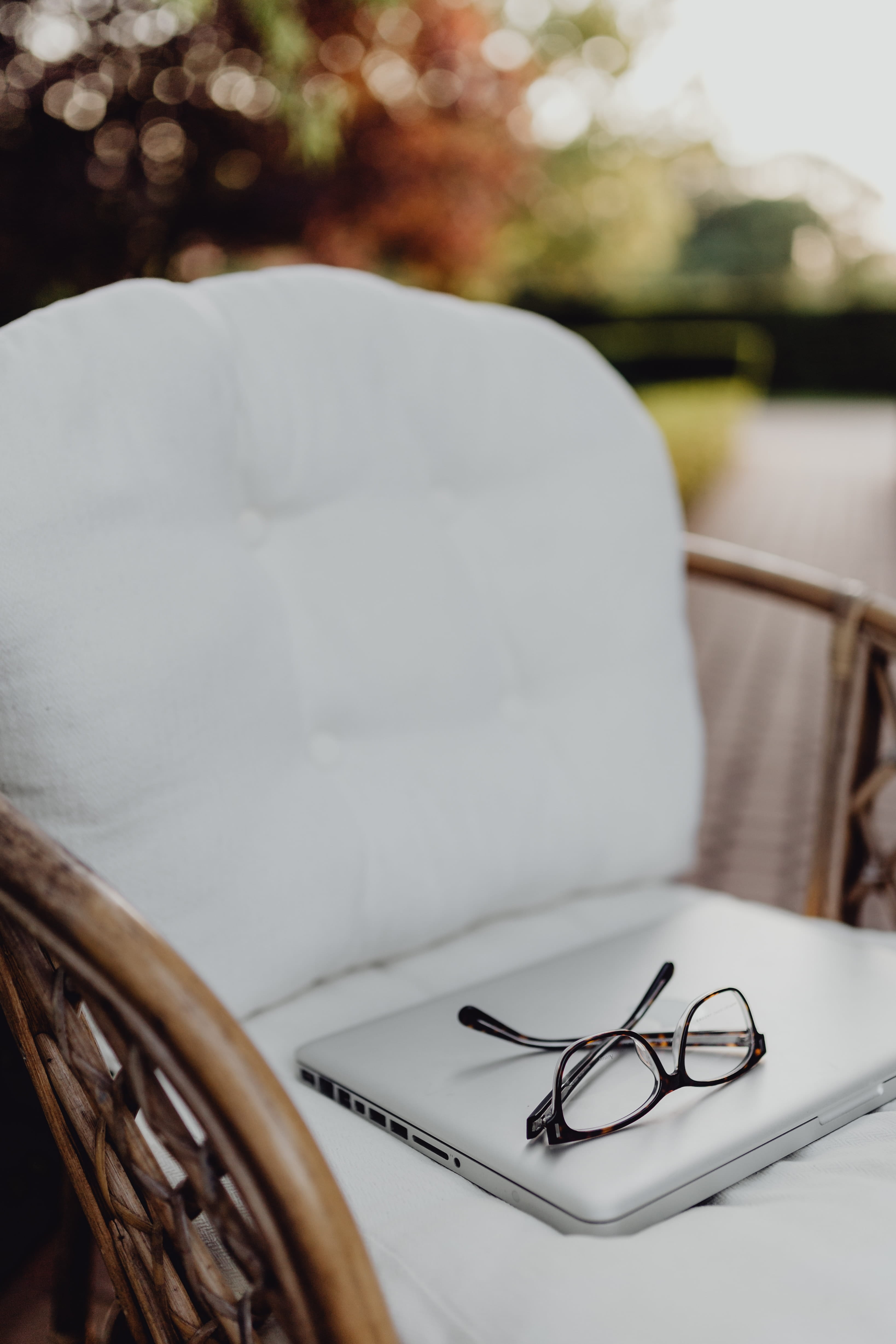 close-up, rattan, furniture, creativity, computer, white color, publication, nature, personal accessory, workspace, eyeglasses, selective focus, art and craft, Phone HD Wallpaper