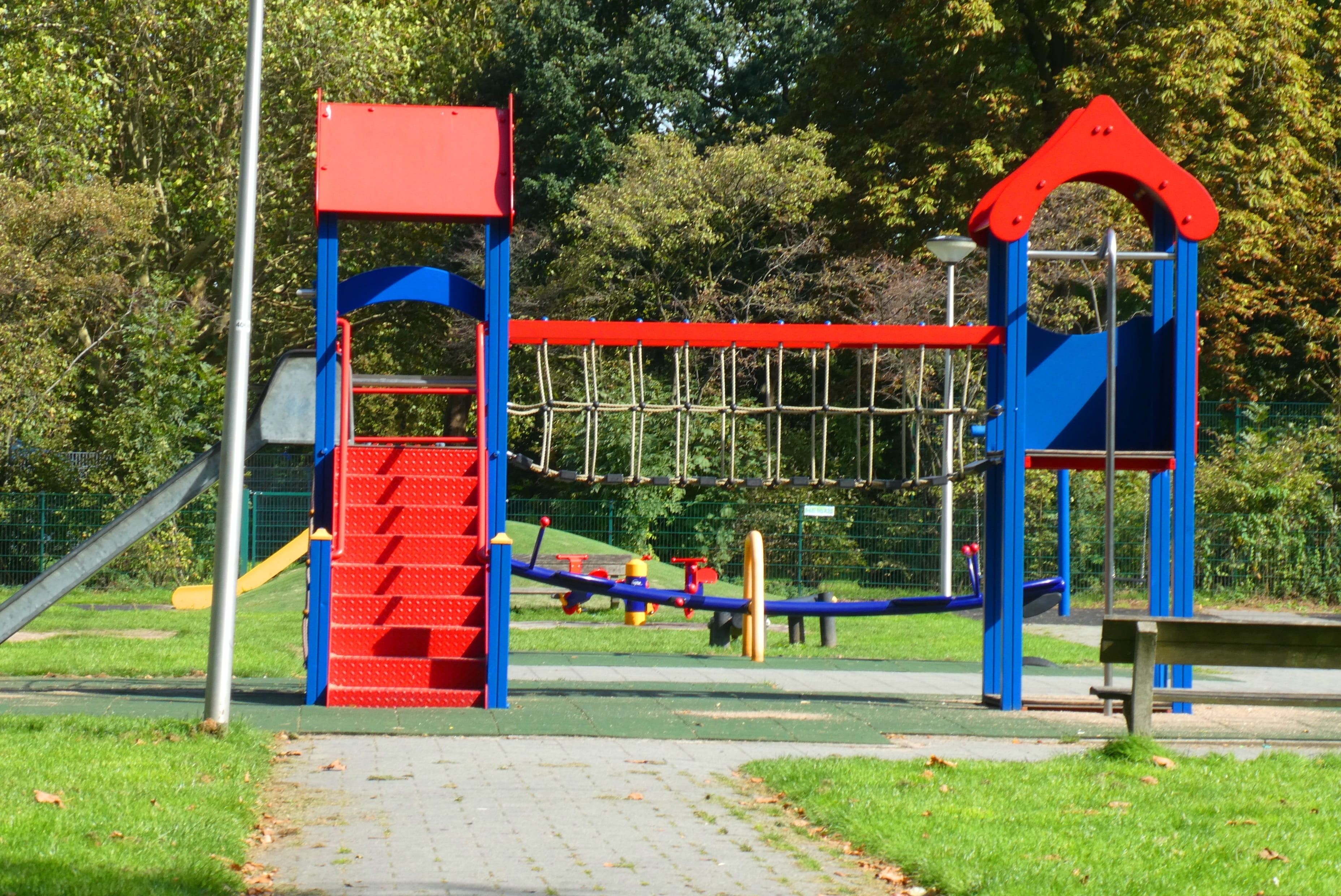 childrens playground, play, childhood, game, red, jungle gym, tree, park, architecture, built structure, sunlight, absence, klimtoestel, 2K, slide - play equipment, HD Wallpaper